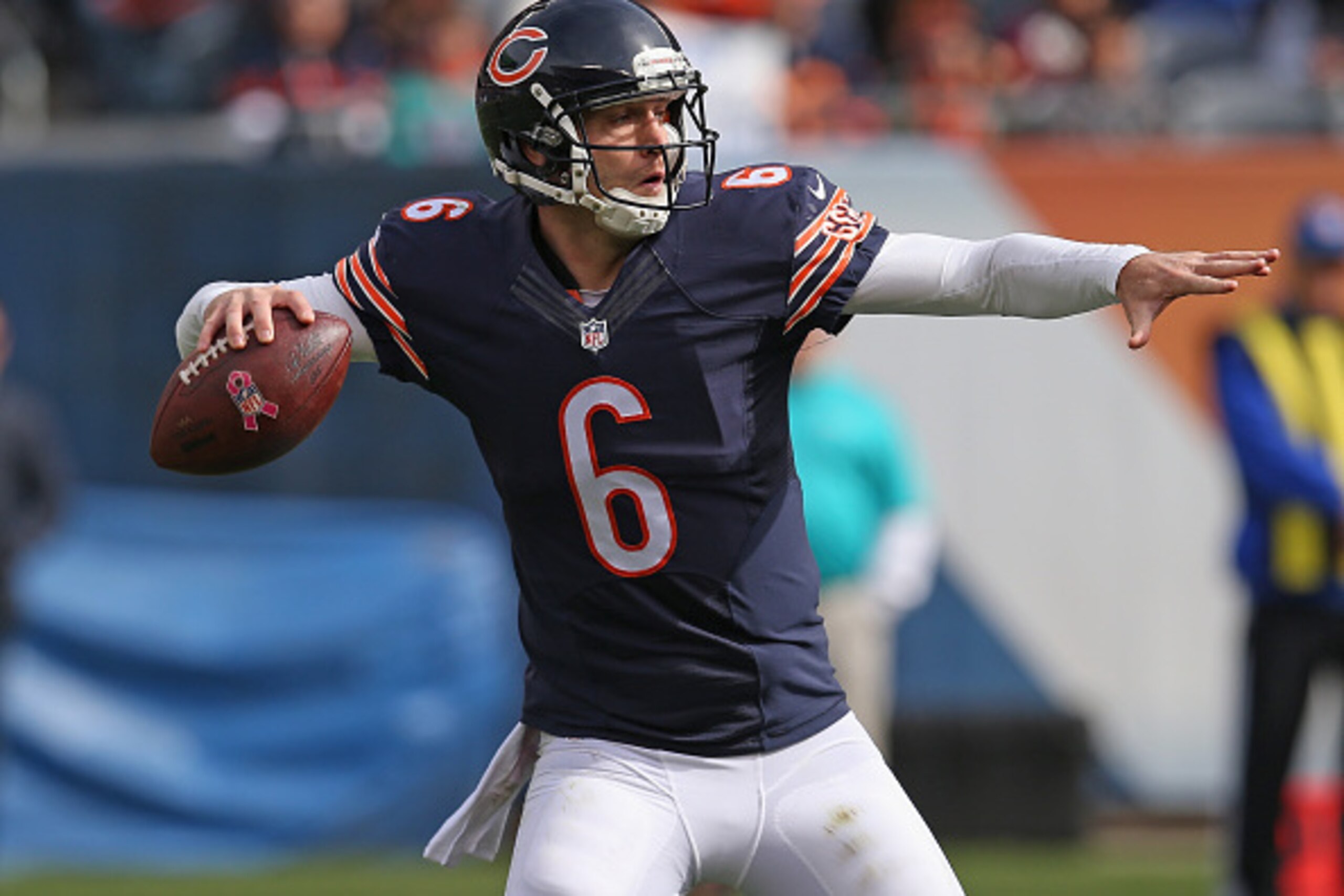 CHICAGO, IL - OCTOBER 19:  Jay Cutler #6 of the Chicago Bears passes against the Miami Dolphins at Soldier Field on October 19, 2014 in Chicago, Illinois. The Dolphins defeated the Bears 27-14.  (Photo by Jonathan Daniel/Getty Images)