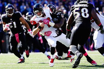 BALTIMORE, MD - OCTOBER 19: Quarterback Matt Ryan #2 of the Atlanta Falcons is sacked in the second quarter by linebacker Pernell McPhee #90 of the Baltimore Ravens at M&T Bank Stadium on October 19, 2014 in Baltimore, Maryland.  (Photo by Rob Carr/Getty 