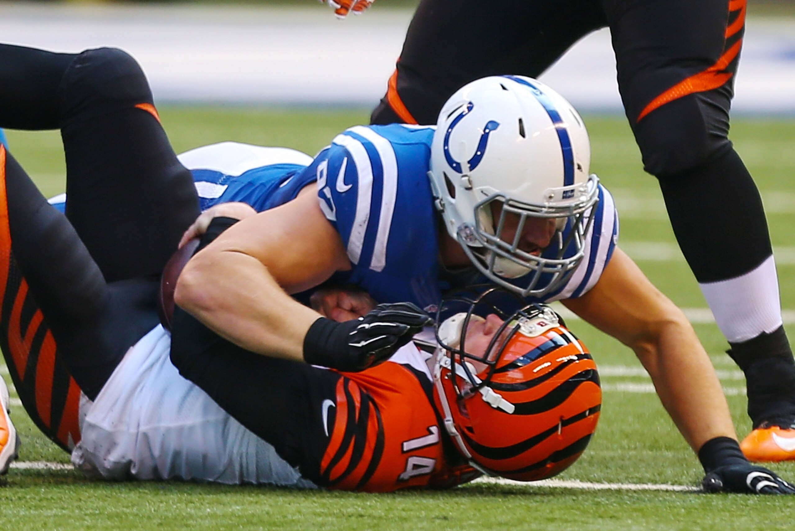 Oct 19, 2014; Indianapolis, IN, USA;  Indianapolis Colts linebacker Bjoern Werner (92) sacks Cincinnati Bengals quarterback Andy Dalton (14) at Lucas Oil Stadium. Mandatory Credit: Brian Spurlock-USA TODAY Sports