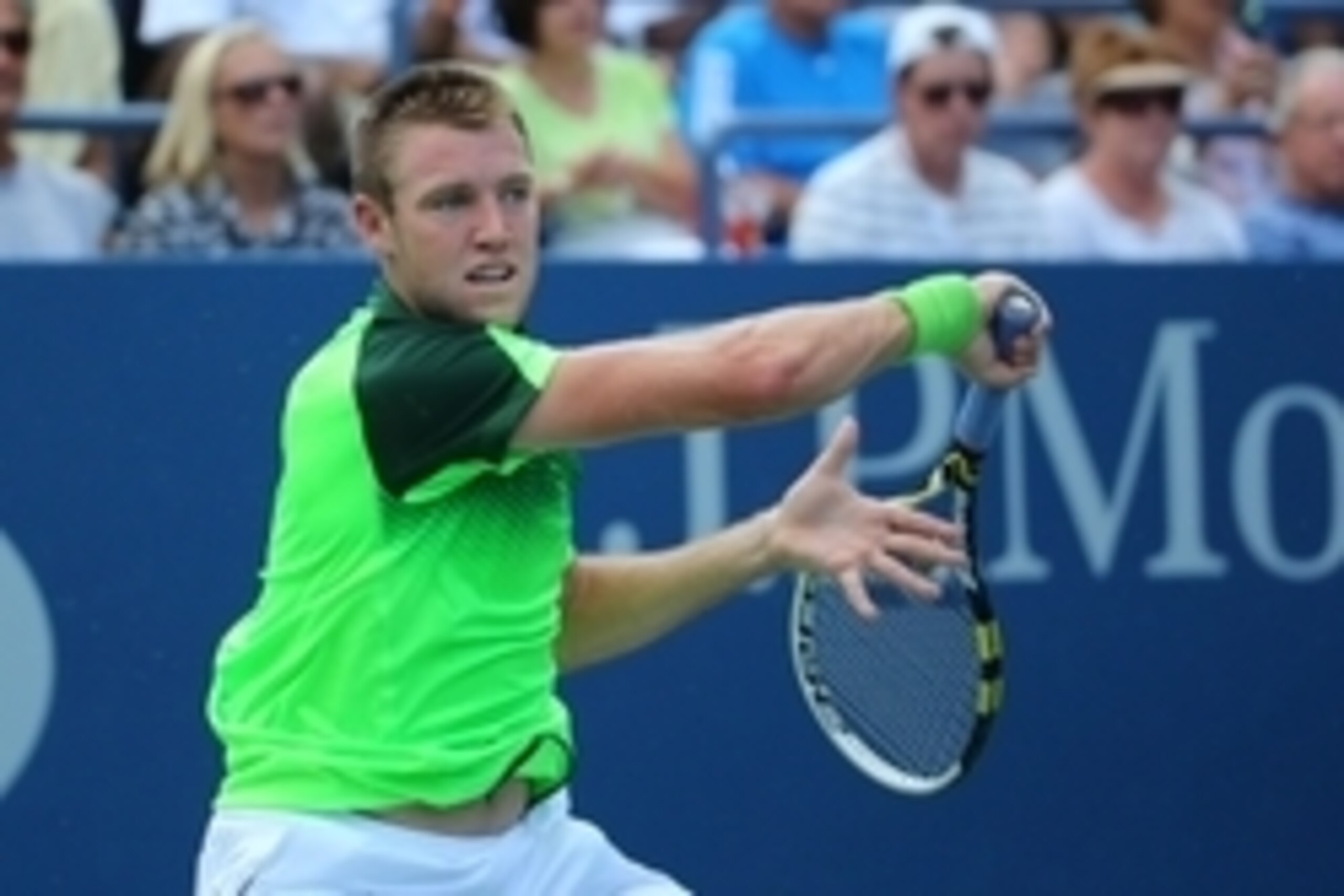 Aug 26, 2014; New York, NY, USA;  Jack Sock (USA) returns a shot to Pablo Andujar (ESP) on the Grandstand Court on day two of the 2014 U.S. Open tennis tournament at USTA Billie Jean King National Tennis Center. Mandatory Credit: Anthony Gruppuso-USA TODA