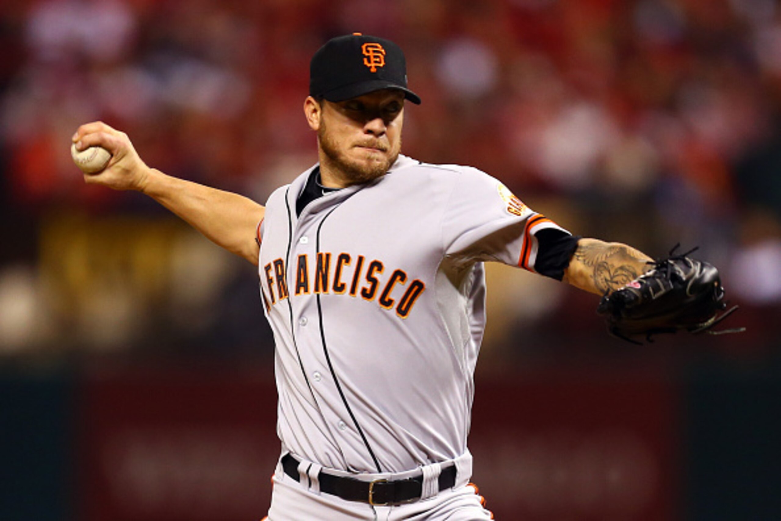 ST LOUIS, MO - OCTOBER 12:  Jake Peavy #22 of the San Francisco Giants pitches against the St. Louis Cardinals during Game Two of the National League Championship Series at Busch Stadium on October 12, 2014 in St Louis, Missouri.  (Photo by Dilip Vishwana