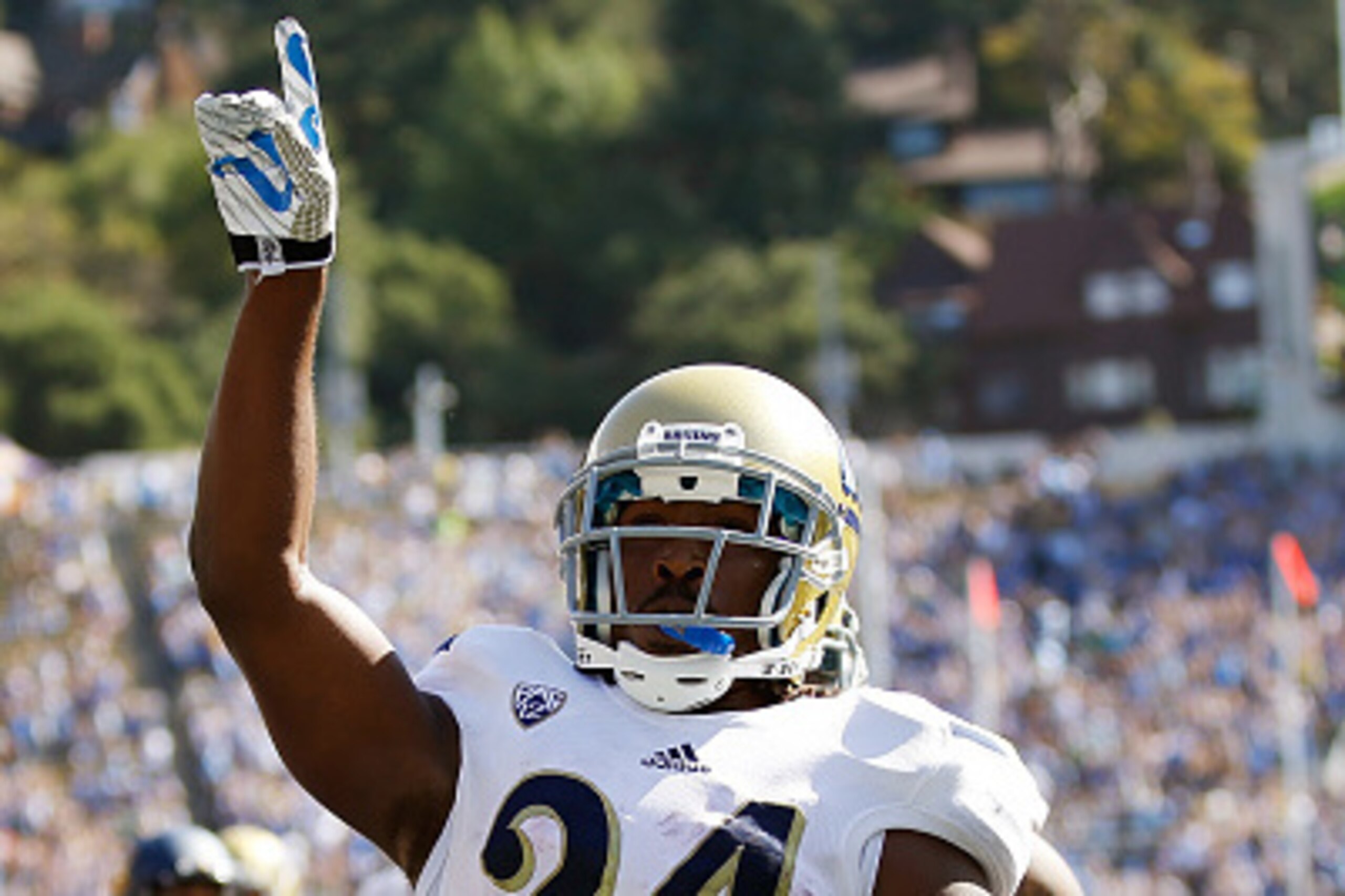 BERKELEY, CA - OCTOBER 18:  Paul Perkins #24 of the UCLA Bruins celebrates after scoring a touchdown against the California Golden Bears during the first quarter at Kabam Field at California Memorial Stadium on October 18, 2014 in Berkeley, California.  (