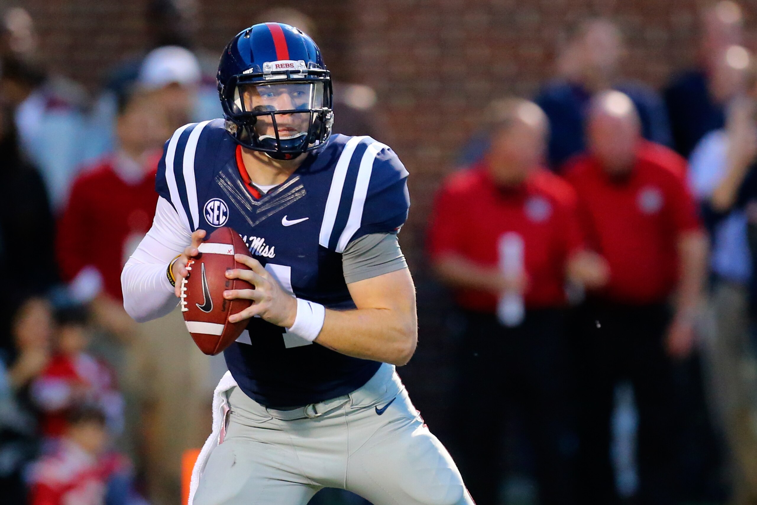 Oct 18, 2014; Oxford, MS, USA; Mississippi Rebels quarterback Bo Wallace (14) drops back to pass the ball during the game against the Tennessee Volunteers at Vaught-Hemingway Stadium. Mandatory Credit: Spruce Derden-USA TODAY Sports Oct 18, 2014; Oxford, MS, USA; Mississippi Rebels quarterback Bo Wallace (14) drops back to pass the ball during the game against the Tennessee Volunteers at Vaught-Hemingway Stadium. Mandatory Credit: Spruce Derden-USA TODAY Sports