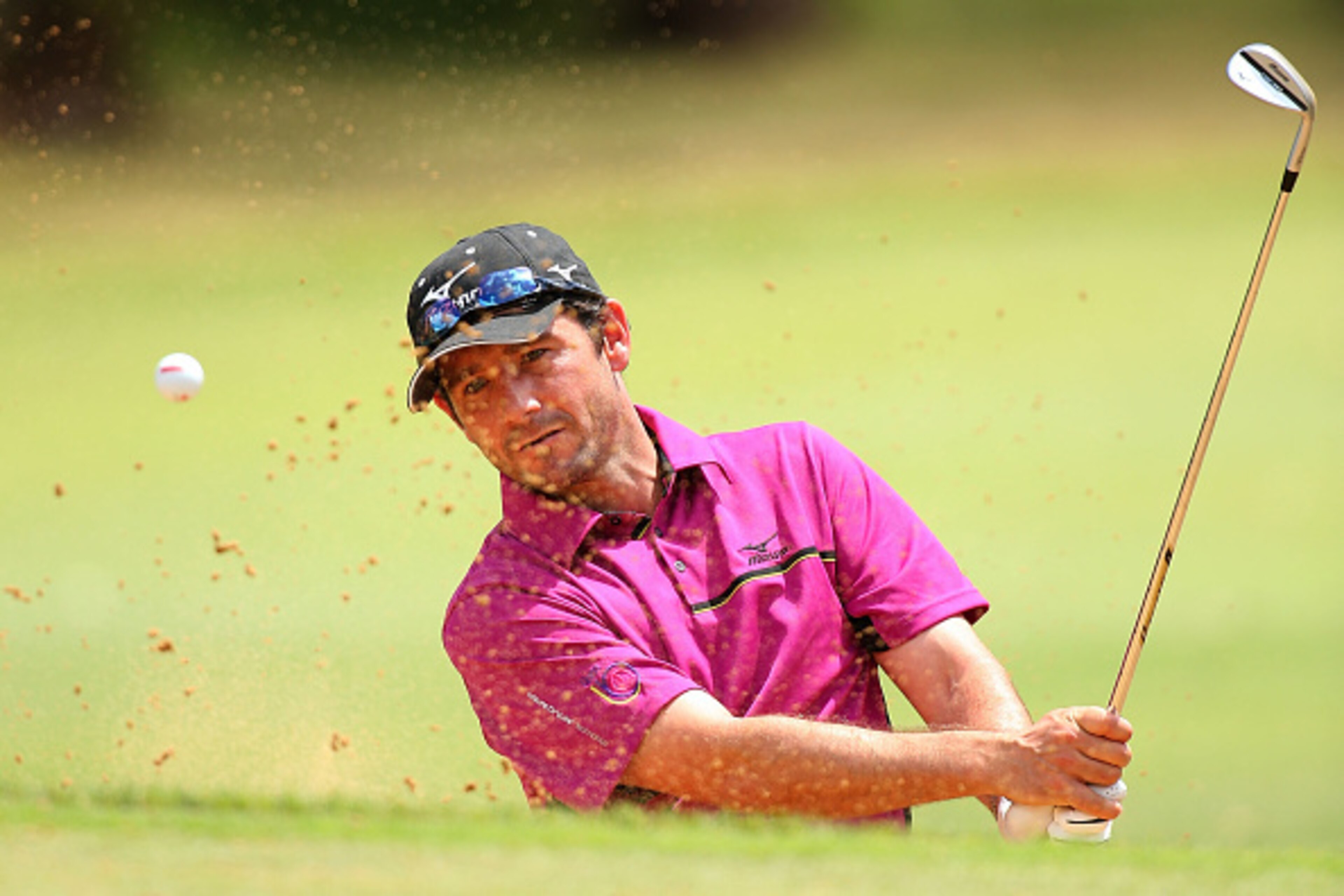 PERTH, AUSTRALIA - OCTOBER 23:  Peter Whiteford of Scotland plays out of a bunker on the 15th hole during day one of the 2014 Perth International at Lake Karrinyup Country Club on October 23, 2014 in Perth, Australia.  (Photo by Paul Kane/Getty Images)