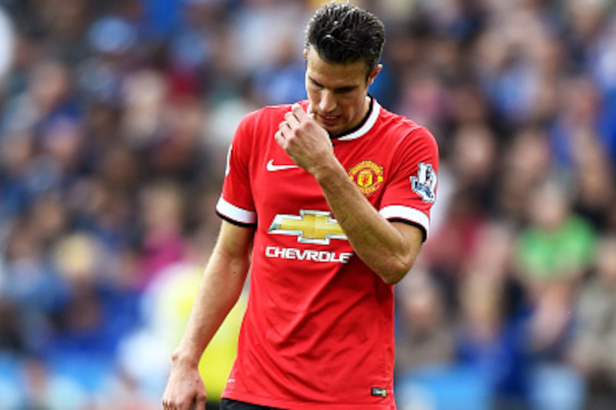 LEICESTER, ENGLAND - SEPTEMBER 21:  A dejected Robin van Persie of Manchester United looks on following his team's 5-3 defeat during the Barclays Premier League match between Leicester City and Manchester United at The King Power Stadium on September 21, 