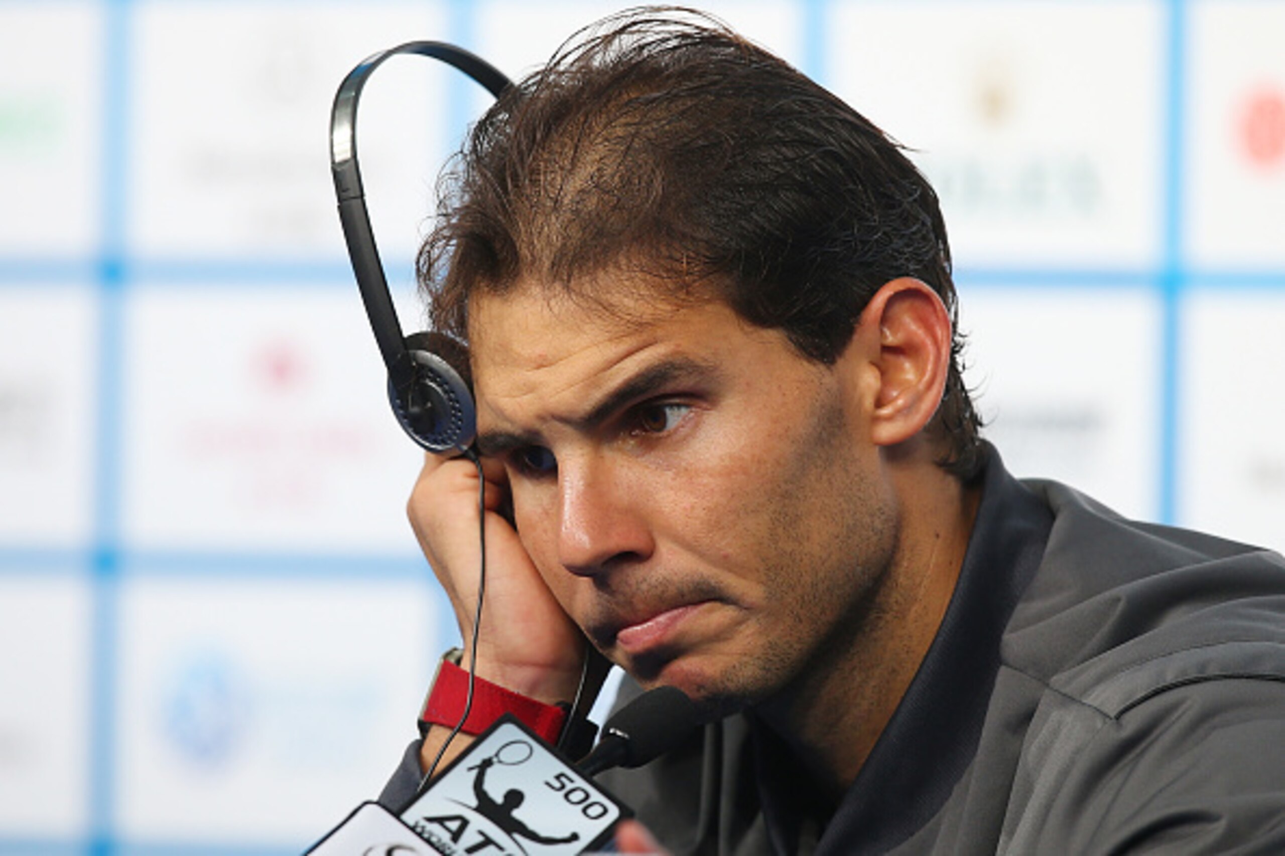 BEIJING, CHINA - OCTOBER 03:  Rafael Nadal of Spain speaks to media after losing his match against Martin Klizan of Slovakia during during day seven of the China Open at the National Tennis Center on October 3, 2014 in Beijing, China.  (Photo by Chris Hyd