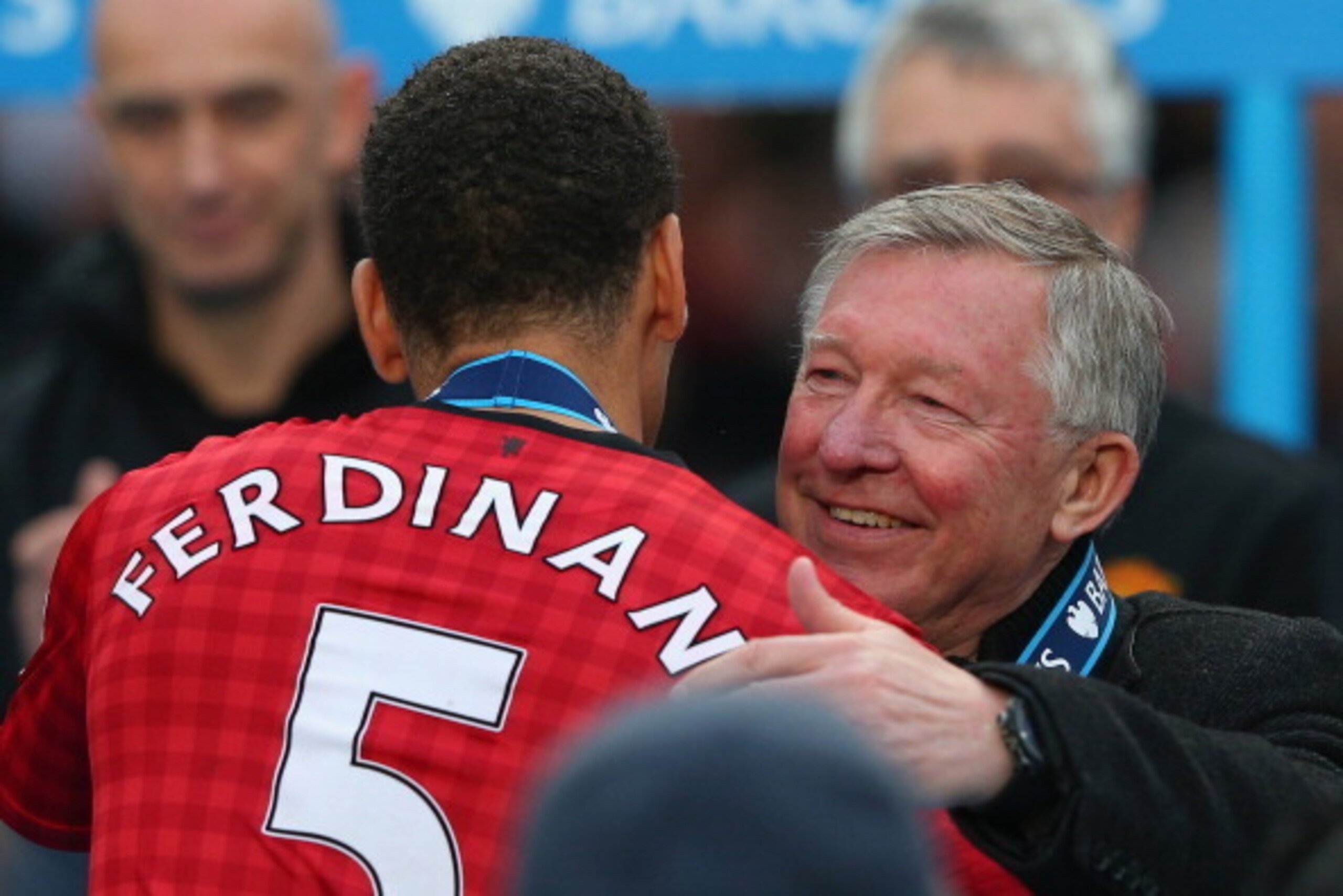 MANCHESTER, ENGLAND - MAY 12:  Manchester United Manager Sir Alex Ferguson embraces Rio Ferdinand following the Barclays Premier League match between Manchester United and Swansea City at Old Trafford on May 12, 2013 in Manchester, England.  (Photo by Ale