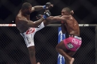 Apr 26, 2014; Baltimore, MD, USA;   Anthony Johnson (blue gloves) fights Phil Davis (red gloves) during UFC 172 at Baltimore Arena.  Mandatory Credit: Tommy Gilligan-USA TODAY Sports