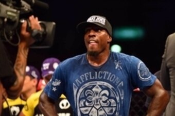 Aug 3, 2013; Rio De Janeiro, Brazil; Phil Davis (pink shorts) celebrates after defeating Lyoto Machida (not pictured) during UFC 163 at HSBC Arena. Mandatory Credit: Jason Silva-USA TODAY Sports