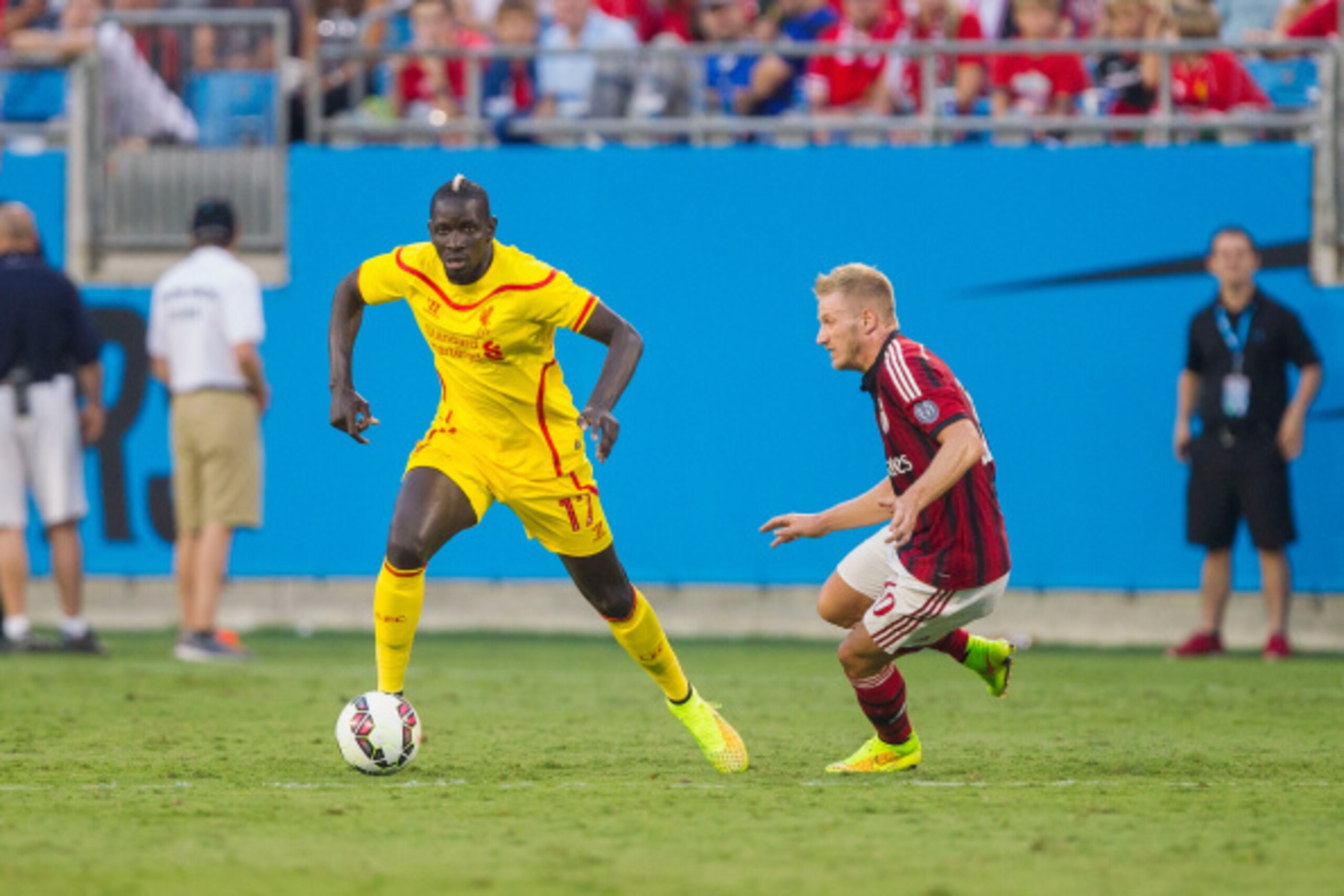 CHARLOTTE, NC - AUGUST 02: Mamadou Sakho #17 of Liverpool keeps the ball away from Ignazio Abate #20 of A.C. Milan in the Guinness International Champions Cup at Bank of America Stadium on August 2, 2014 in Charlotte, North Carolina. Liverpool defeated A.