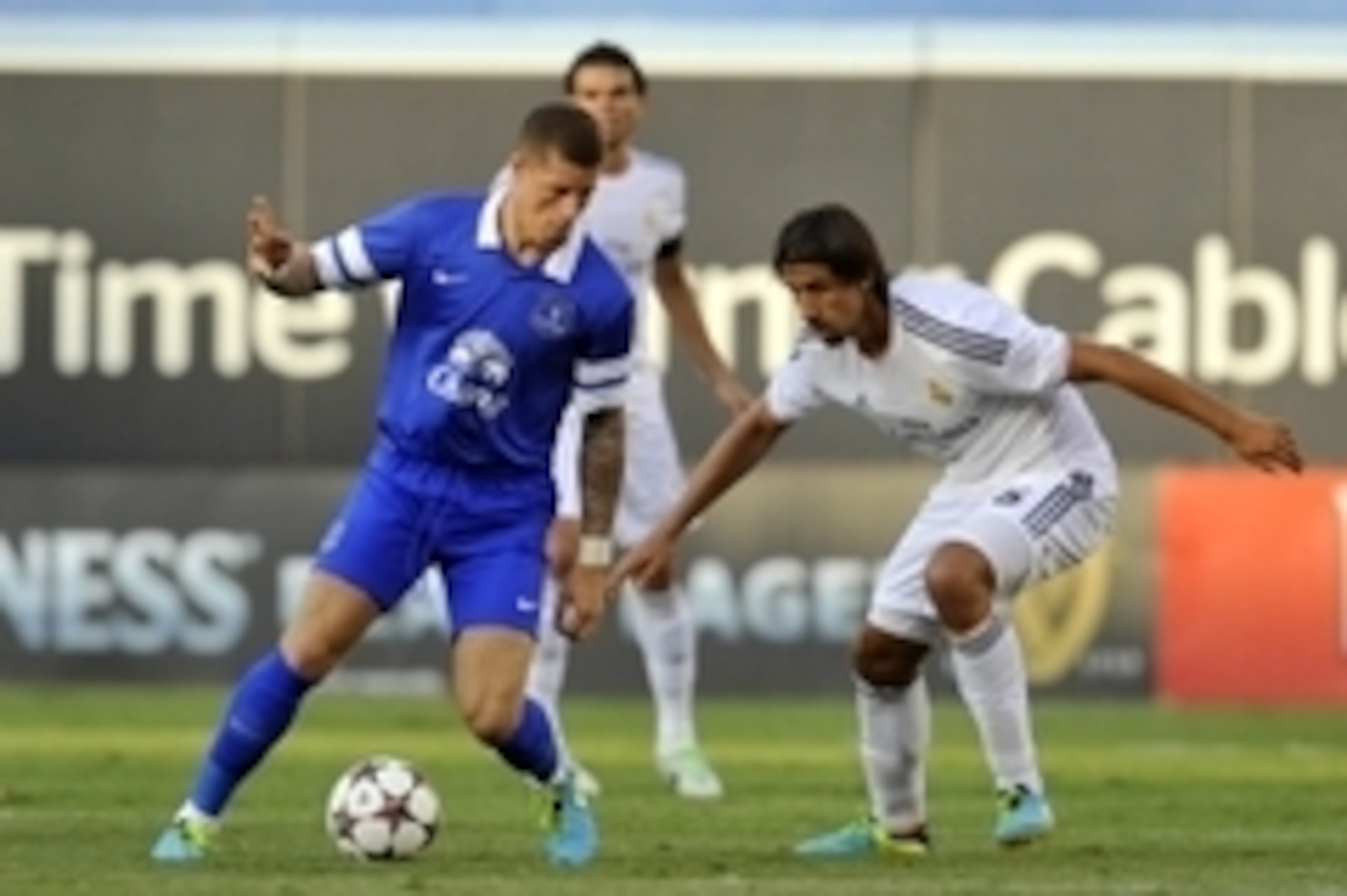 August 3, 2013; Los Angeles, CA, USA; Everton midfielder Ross Barkley (20) moves the ball against Real Madrid midfielder Sami Khedira (6) during the second half of the International Champions Cup at Dodger Stadium. Mandatory Credit: Gary A. Vasquez-USA TO