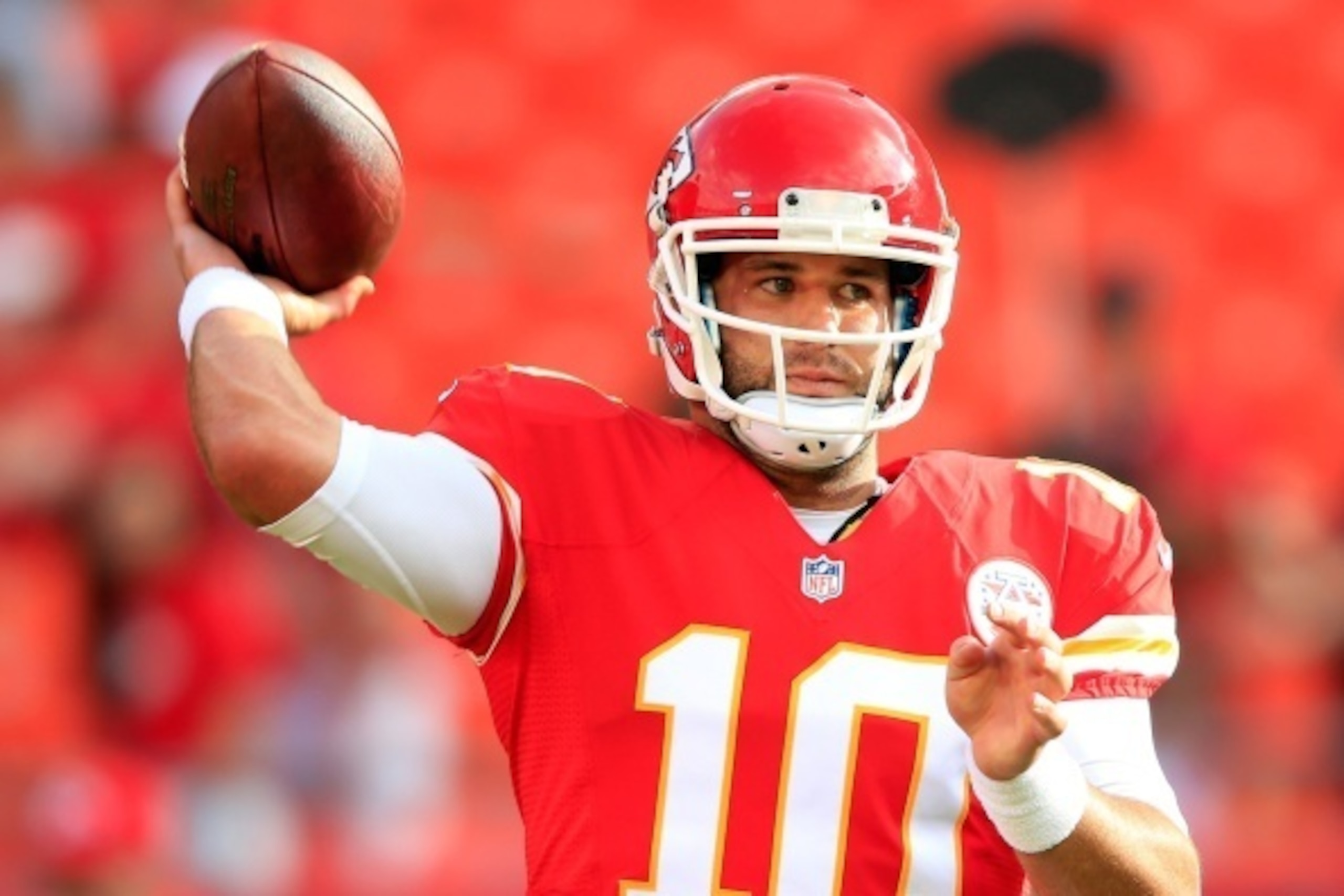 KANSAS CITY, MO - AUGUST 07:  Quarterback Chase Daniel #10 of the Kansas City Chiefs warms up prior to the preseason game against the Cincinnati Bengals at Arrowhead Stadium on August 7, 2014 in Kansas City, Missouri.  (Photo by Jamie Squire/Getty Images)