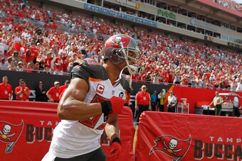 Sep 7, 2014; Tampa, FL, USA;Tampa Bay Buccaneers wide receiver Vincent Jackson (83) runs out of the tunnel before the game against the Carolina Panthers at Raymond James Stadium. Mandatory Credit: Kim Klement-USA TODAY Sports