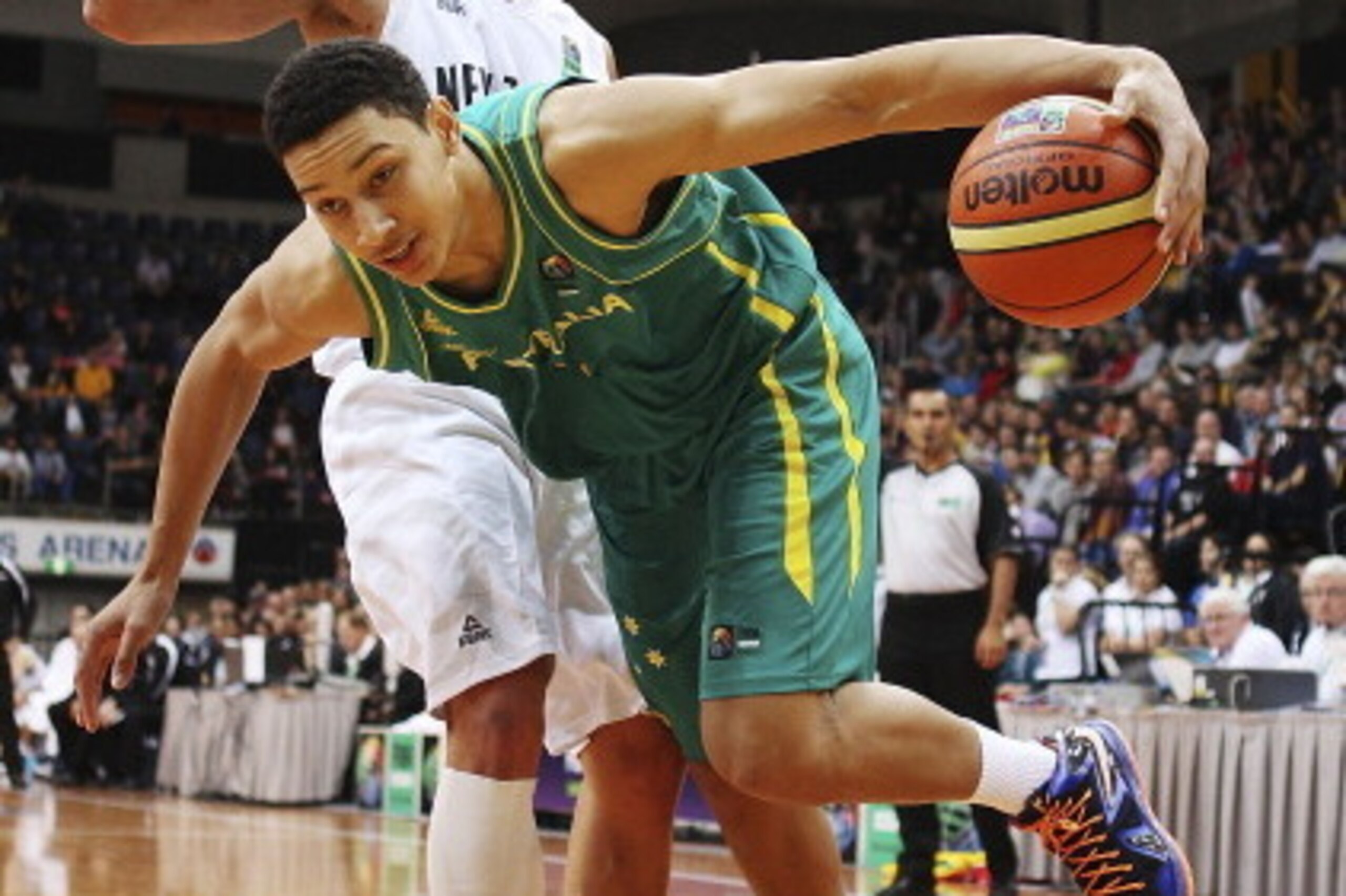 CANBERRA, AUSTRALIA - AUGUST 18: Ben Simmons of the Boomers drives the ball to the basket during the Men's FIBA Oceania Championship match between the Australian Boomers and the New Zealand Tall Blacks at AIS on August 18, 2013 in Canberra, Australia. ( CANBERRA, AUSTRALIA - AUGUST 18: Ben Simmons of the Boomers drives the ball to the basket during the Men's FIBA Oceania Championship match between the Australian Boomers and the New Zealand Tall Blacks at AIS on August 18, 2013 in Canberra, Australia. (