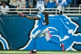 Oct 5, 2014; Detroit, MI, USA; Detroit Lions cornerback Rashean Mathis (31) runs back an interception for a touchdown during the second quarter against the Buffalo Bills at Ford Field. Mandatory Credit: Tim Fuller-USA TODAY Sports