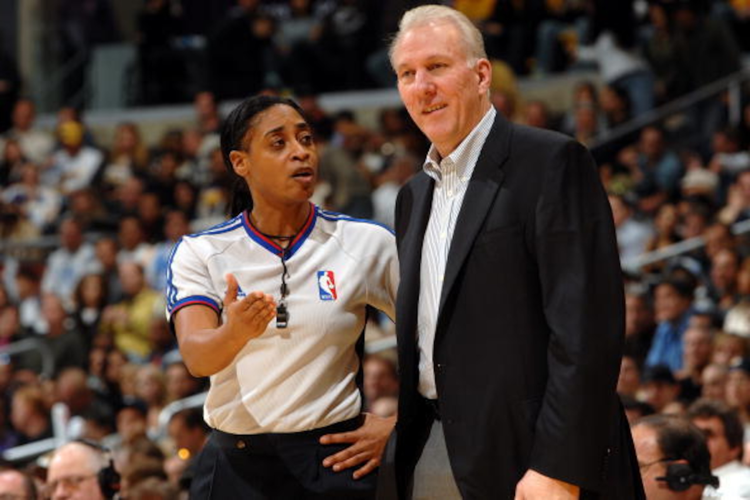 LOS ANGELES - JANUARY 28:  Referee Violet Palmer #12 talks with head coach Gregg Popovich of the San Antonio Spurs on the sideline during the NBA game against the Los Angeles Lakers on January 28, 2007 at Staples Center in Los Angeles, California. The Spu