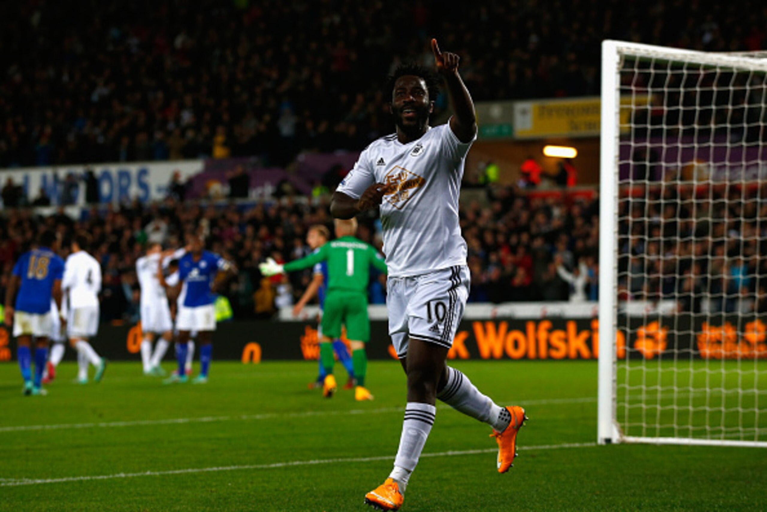 SWANSEA, WALES - OCTOBER 25:  Wilfried Bony of Swansea City celebrates scoring their second goal during the Barclays Premier League match between Swansea City and Leicester City at Liberty Stadium on October 25, 2014 in Swansea, Wales.  (Photo by Clive Ro