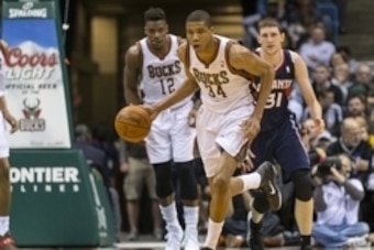 Apr 16, 2014; Milwaukee, WI, USA; Milwaukee Bucks guard Giannis Antetokounmpo (34) heads up court with the ball during the fourth quarter against the Atlanta Hawks at BMO Harris Bradley Center.  Atlanta won 111-103.  Mandatory Credit: Jeff Hanisch-USA TOD