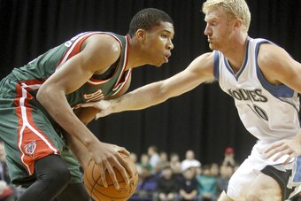 Giannis faces up against Minnesota Timberwolves forward Chase Budinger