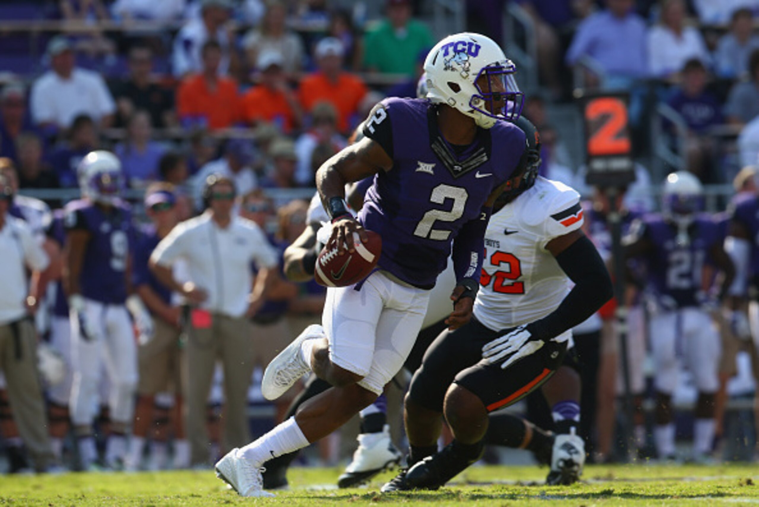 FORT WORTH, TX - OCTOBER 18:  Trevone Boykin #2 of the TCU Horned Frogs throws against the Oklahoma State Cowboys at Amon G. Carter Stadium on October 18, 2014 in Fort Worth, Texas.  (Photo by Ronald Martinez/Getty Images)