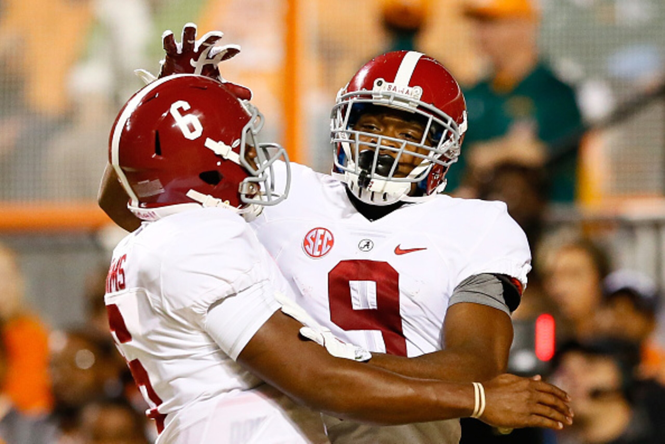 KNOXVILLE, TN - OCTOBER 25: Amari Cooper #9 of the Alabama Crimson Tide reacts after pulling in a reception for a touchdown from Blake Sims #6 against the Tennessee Volunteers at Neyland Stadium on October 25, 2014 in Knoxville, Tennessee. (Photo by Kev KNOXVILLE, TN - OCTOBER 25: Amari Cooper #9 of the Alabama Crimson Tide reacts after pulling in a reception for a touchdown from Blake Sims #6 against the Tennessee Volunteers at Neyland Stadium on October 25, 2014 in Knoxville, Tennessee. (Photo by Kev