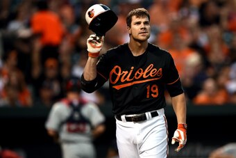 BALTIMORE, MD - AUGUST 29: Chris Davis #19 of the Baltimore Orioles reacts after striking out in the second inning against the Minnesota Twins at Oriole Park at Camden Yards on August 29, 2014 in Baltimore, Maryland. (Photo by Patrick Smith/Getty Images)