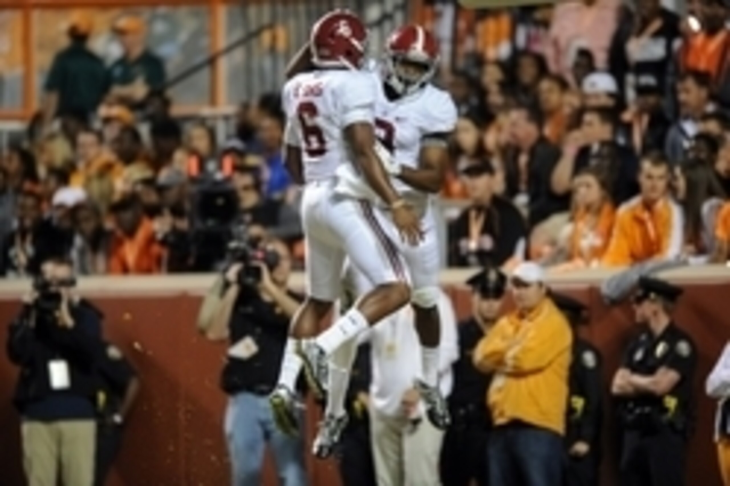 Oct 25, 2014; Knoxville, TN, USA; Alabama Crimson Tide quarterback Blake Sims (6) and wide receiver Amari Cooper (9) celebrate a touchdown against the Tennessee Volunteers during the first quarter at Neyland Stadium. Mandatory Credit: Randy Sartin-USA TOD