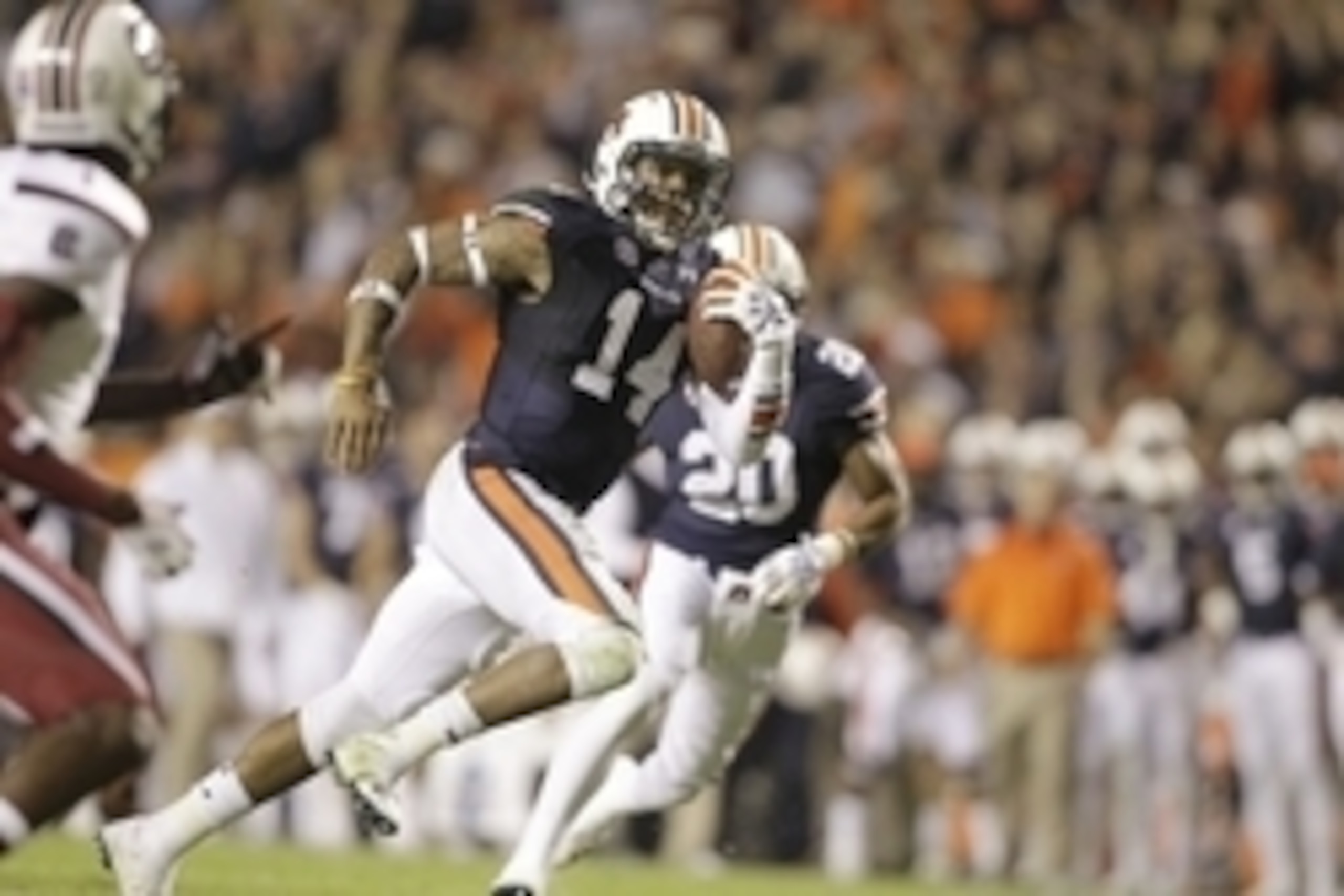 Oct 25, 2014; Auburn, AL, USA; Auburn Tigers quarterback Nick Marshall (14) scores a touchdown against the South Carolina Gamecocks during the first half at Jordan Hare Stadium. Mandatory Credit: John Reed-USA TODAY Sports