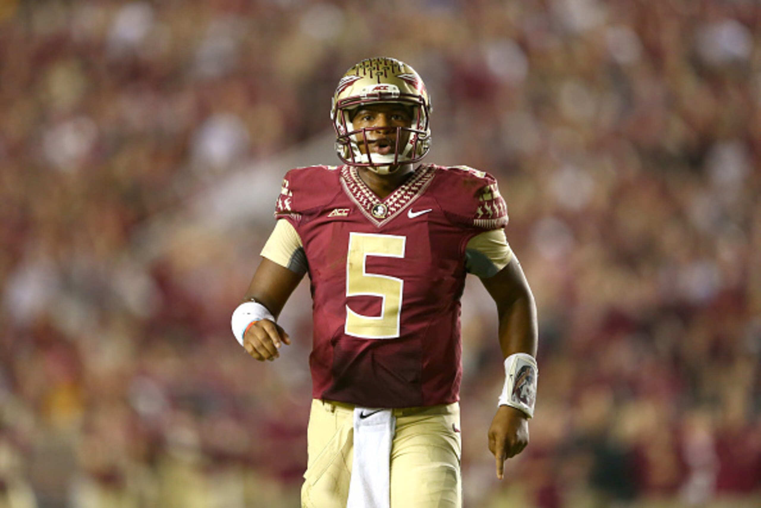 TALLAHASSEE, FL - OCTOBER 18:  Jameis Winston #5 of the Florida State Seminoles reacts after a play against the Notre Dame Fighting Irish during their game at Doak Campbell Stadium on October 18, 2014 in Tallahassee, Florida.  (Photo by Streeter Lecka/Get