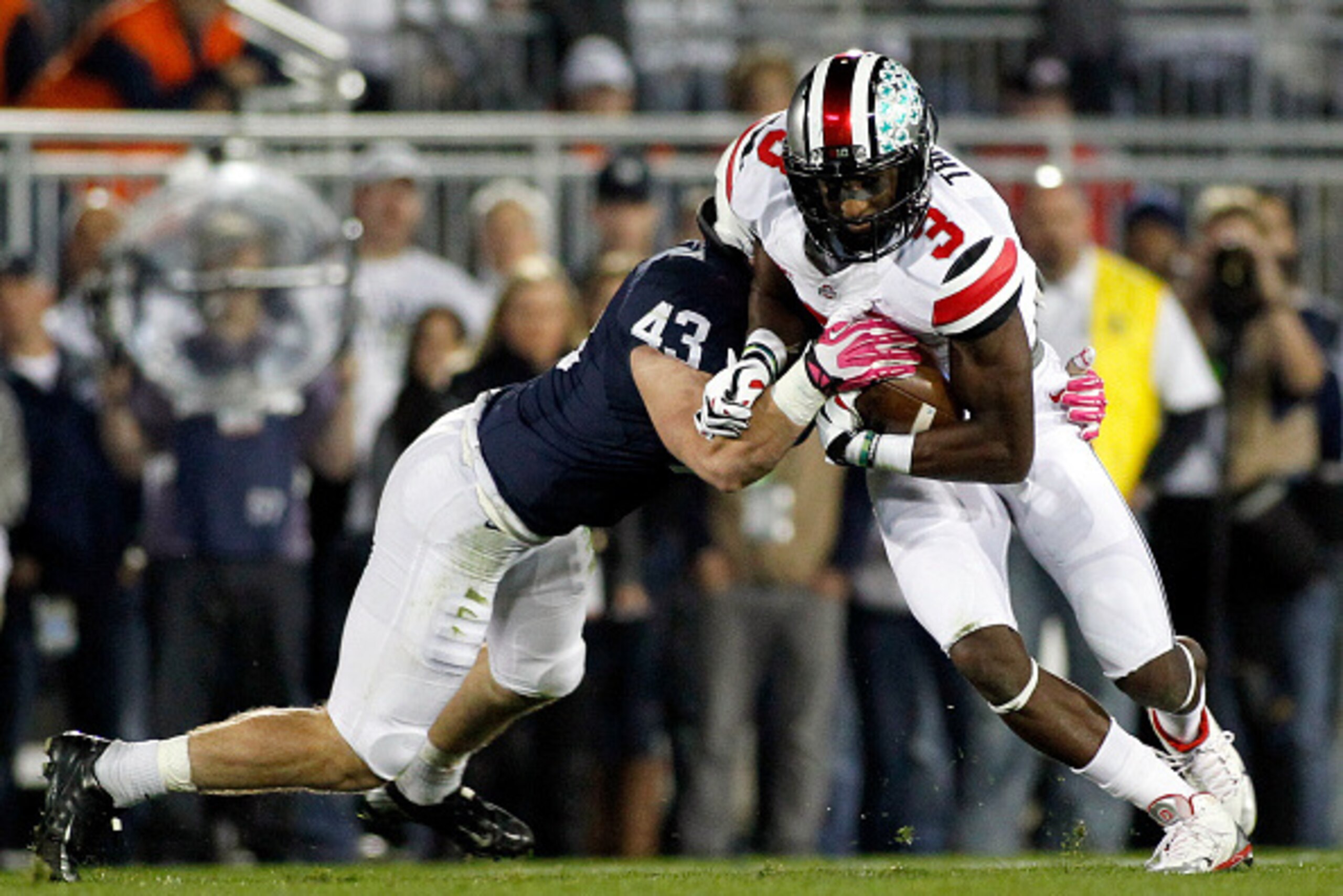 STATE COLLEGE, PA - OCTOBER 25: Michael Thomas #3 of the Ohio State Buckeyes rushes against Mike Hull #43 of the Penn State Nittany Lions during the game on October 25, 2014 at Beaver Stadium in State College, Pennsylvania. (Photo by Justin K. Aller/Get STATE COLLEGE, PA - OCTOBER 25: Michael Thomas #3 of the Ohio State Buckeyes rushes against Mike Hull #43 of the Penn State Nittany Lions during the game on October 25, 2014 at Beaver Stadium in State College, Pennsylvania. (Photo by Justin K. Aller/Get