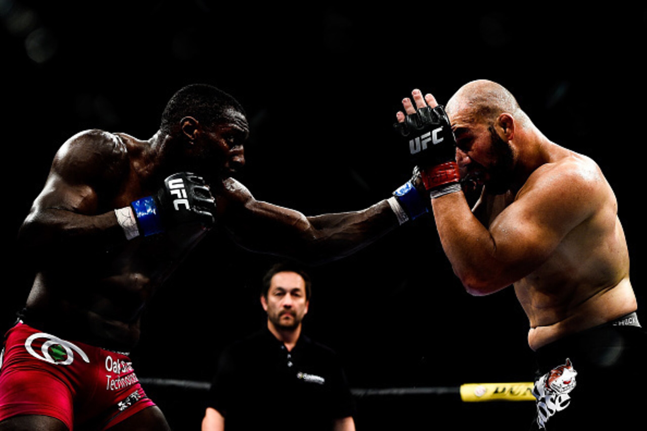 RIO DE JANEIRO, BRAZIL - OCTOBER 25:  Phil Davis of the United States punches Glover Teixeira of Brazil in their light heavyweight bout during the UFC 179 event at Maracanazinho on October 25, 2014 in Rio de Janeiro, Brazil.  (Photo by Buda Mendes/Getty I