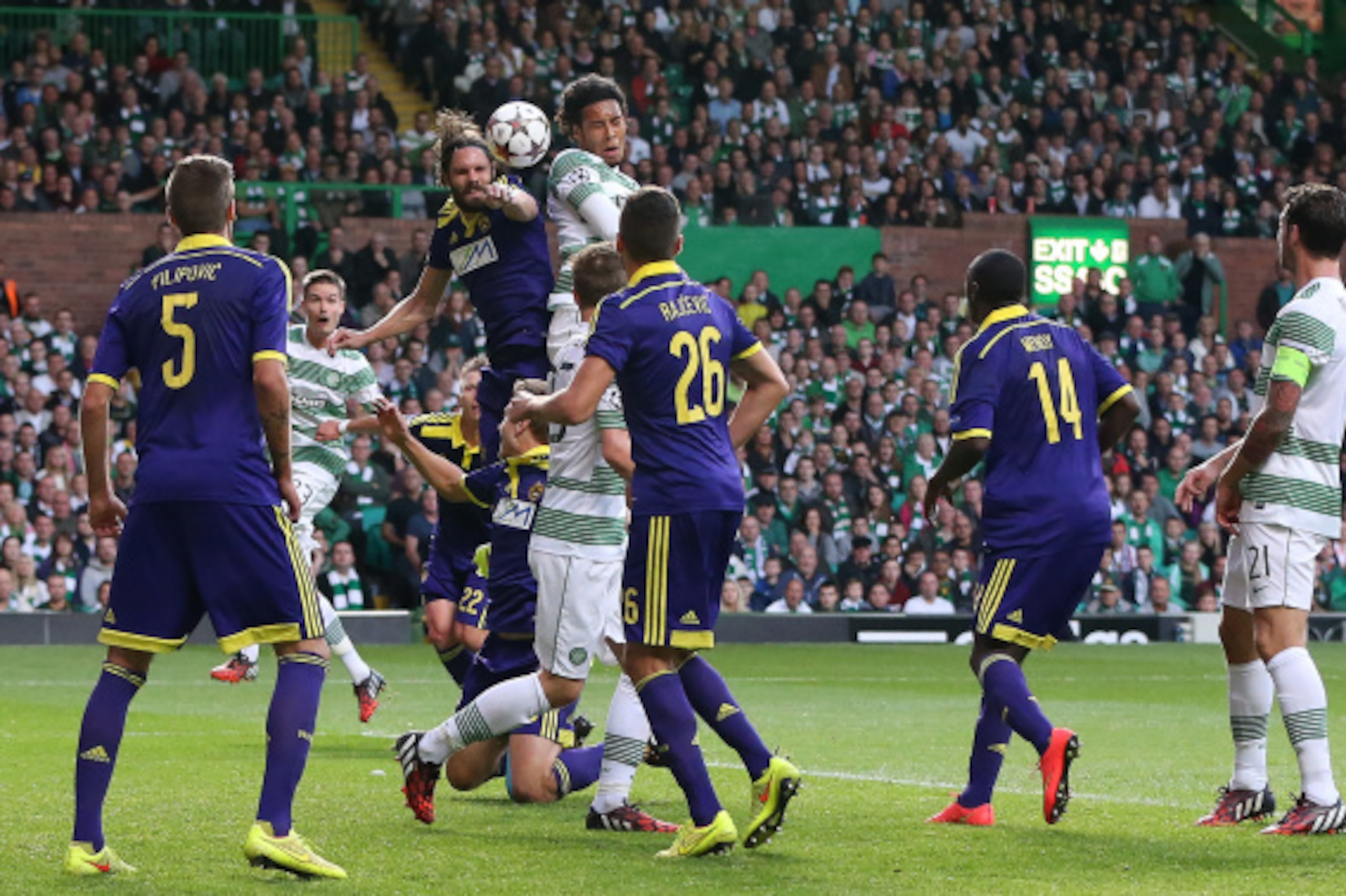GLASGOW, SCOTLAND - AUGUST 26:  Virgil van Dijk of Celtic attempts a header on goal during the UEFA Champions League Qualifying Play-Offs Round, Second Leg
Match between Celtic and Maribor, at Celtic Park on August 26, 2014 Glasgow, Scotland. (Photo by Ia