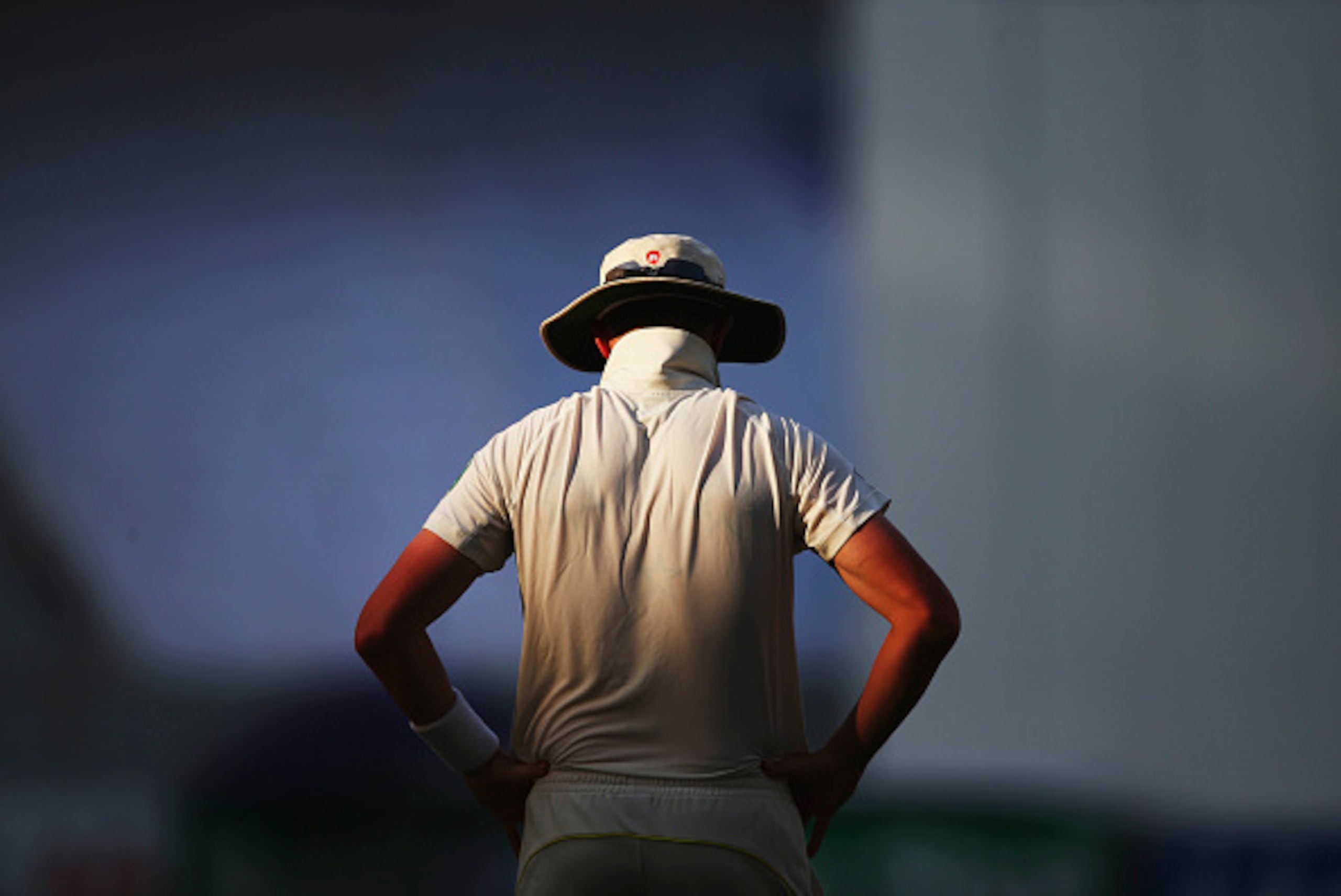 DUBAI, UNITED ARAB EMIRATES - OCTOBER 22:  Peter Siddle of Australia looks on from the outfield during Day One of the First Test between Pakistan and Australia at Dubai International Stadium on October 22, 2014 in Dubai, United Arab Emirates.  (Photo by R