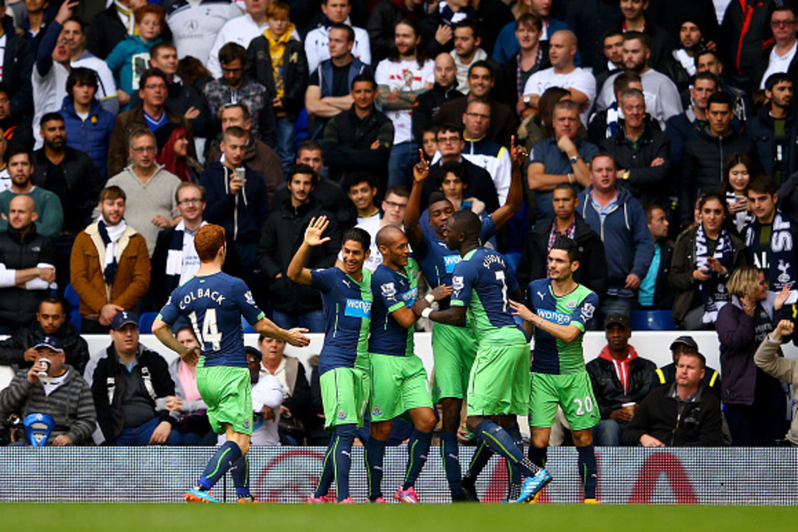 LONDON, ENGLAND - OCTOBER 26:  Sammy Ameobi of Newcastle United celebrates with team-mates after scoring his team's first goal during the Barclays Premier League match between Tottenham Hotspur and Newcastle United at White Hart Lane on October 26, 2014 i