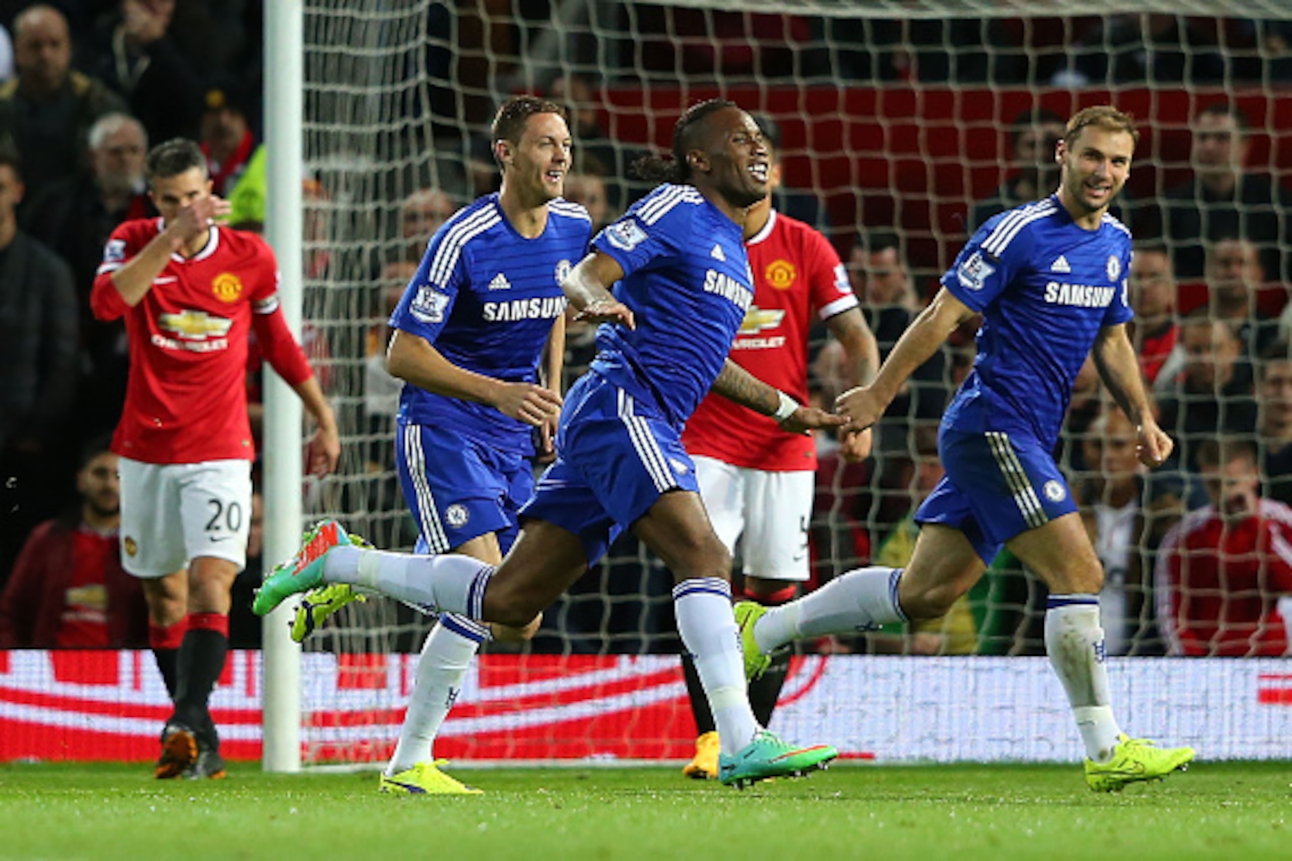MANCHESTER, ENGLAND - OCTOBER 26:  Didier Drogba of Chelsea celebrates scoring the first goal during the Barclays Premier League match between Manchester United and Chelsea at Old Trafford on October 26, 2014 in Manchester, England.  (Photo by Alex Livese