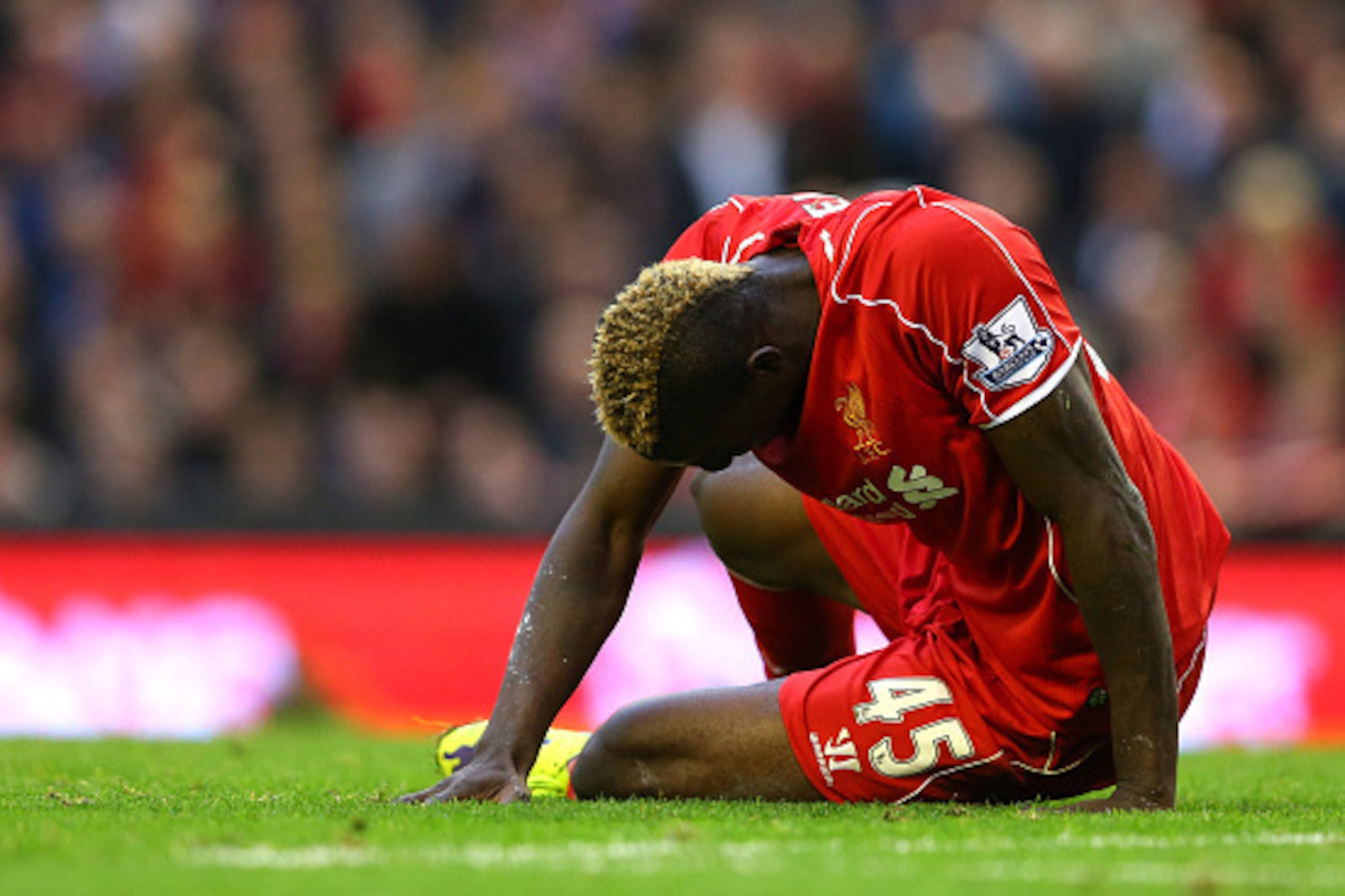 LIVERPOOL, ENGLAND - OCTOBER 25:  Mario Balotelli of Liverpool reacts after having a penalty appeal turned down during the Barclays Premier League match between Liverpool and Hull City at Anfield on October 25, 2014 in Liverpool, England.  (Photo by Alex 