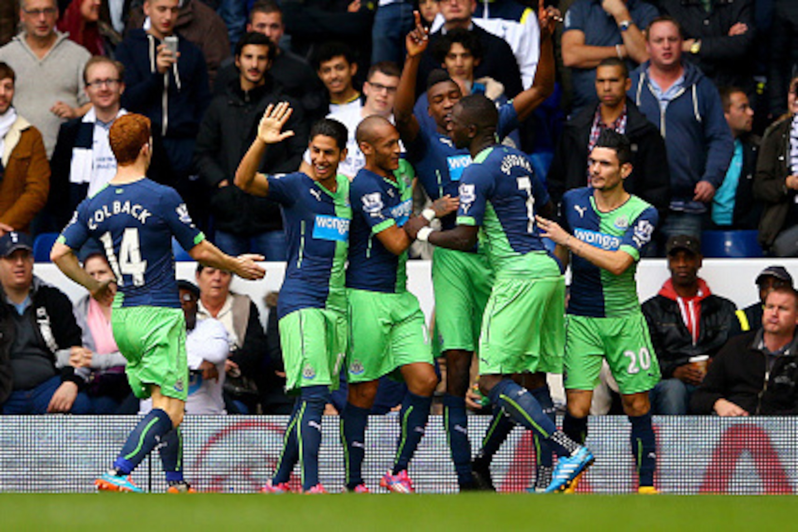LONDON, ENGLAND - OCTOBER 26:  Sammy Ameobi of Newcastle United celebrates with team-mates after scoring his team's first goal during the Barclays Premier League match between Tottenham Hotspur and Newcastle United at White Hart Lane on October 26, 2014 i