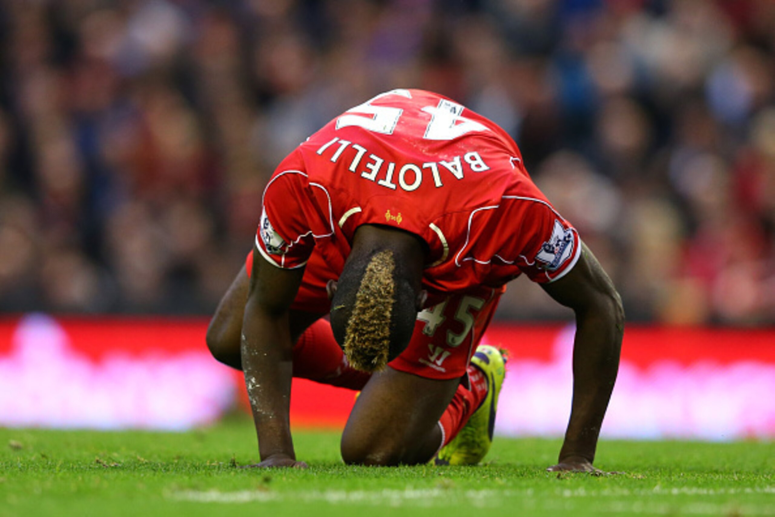 LIVERPOOL, ENGLAND - OCTOBER 25:  Mario Balotelli of Liverpool reacts after having a penalty appeal turned down during the Barclays Premier League match between Liverpool and Hull City at Anfield on October 25, 2014 in Liverpool, England.  (Photo by Alex 