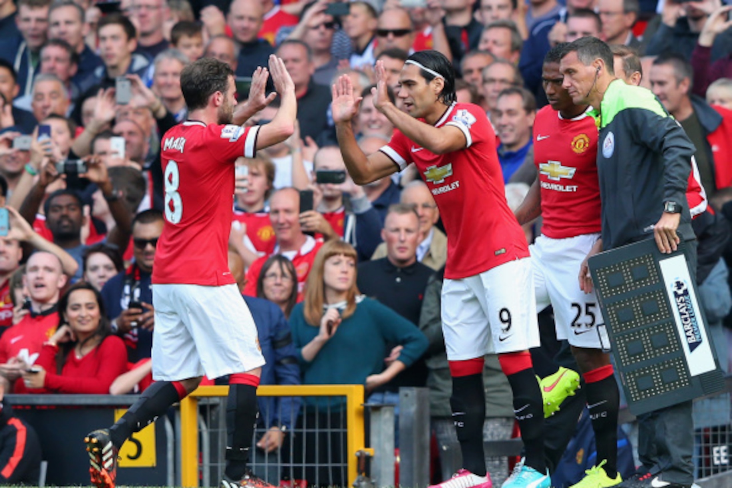 MANCHESTER, ENGLAND - SEPTEMBER 14: Radamel Falcao of Manchester United comes on as a substitute for Juan Mata to make his debut during the Barclays Premier League match between Manchester United and Queens Park Rangers at Old Trafford on September 14, 2 MANCHESTER, ENGLAND - SEPTEMBER 14: Radamel Falcao of Manchester United comes on as a substitute for Juan Mata to make his debut during the Barclays Premier League match between Manchester United and Queens Park Rangers at Old Trafford on September 14, 2