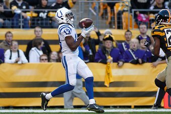 PITTSBURGH, PA - OCTOBER 26:  T.Y. Hilton #13 of the Indianapolis Colts catches a 28 yard touchdown pass during the second quarter against the Pittsburgh Steelers at Heinz Field on October 26, 2014 in Pittsburgh, Pennsylvania.  (Photo by Justin K. Aller/G