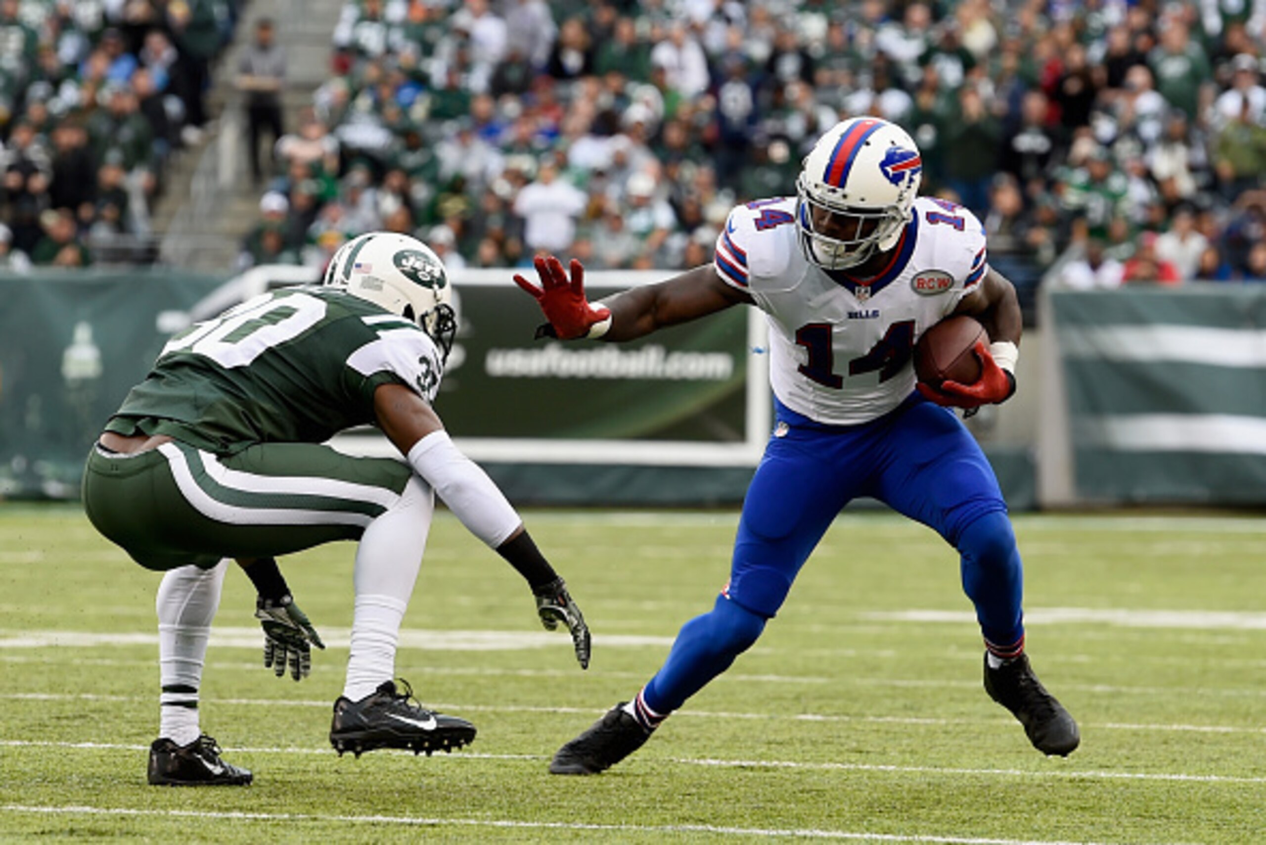 EAST RUTHERFORD, NJ - OCTOBER 26:  Sammy Watkins #14 of the Buffalo Bills runs the ball against  Darrin Walls #30 of the New York Jets in the third quarter at MetLife Stadium on October 26, 2014 in East Rutherford, New Jersey.  (Photo by Alex Goodlett/Get