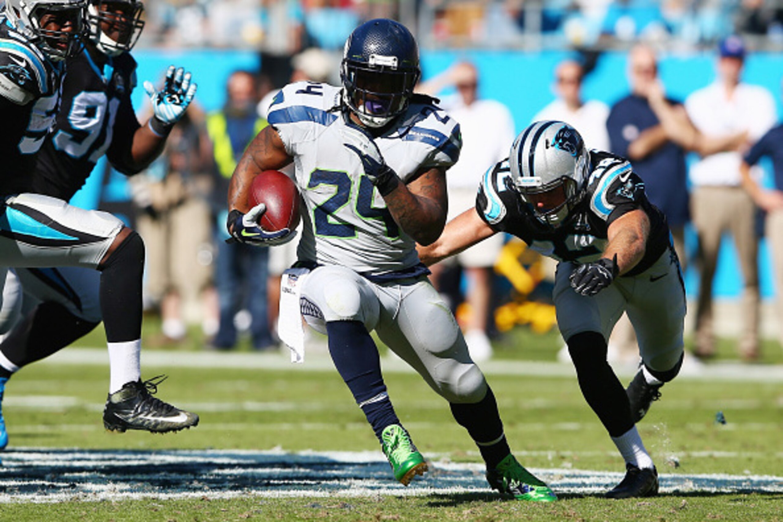 CHARLOTTE, NC - OCTOBER 26: Marshawn Lynch #24 of the Seattle Seahawks runs the ball against the Carolina Panthers in the 3rd quarter during the game at Bank of America Stadium on October 26, 2014 in Charlotte, North Carolina. (Photo by Streeter Lecka/G CHARLOTTE, NC - OCTOBER 26: Marshawn Lynch #24 of the Seattle Seahawks runs the ball against the Carolina Panthers in the 3rd quarter during the game at Bank of America Stadium on October 26, 2014 in Charlotte, North Carolina. (Photo by Streeter Lecka/G