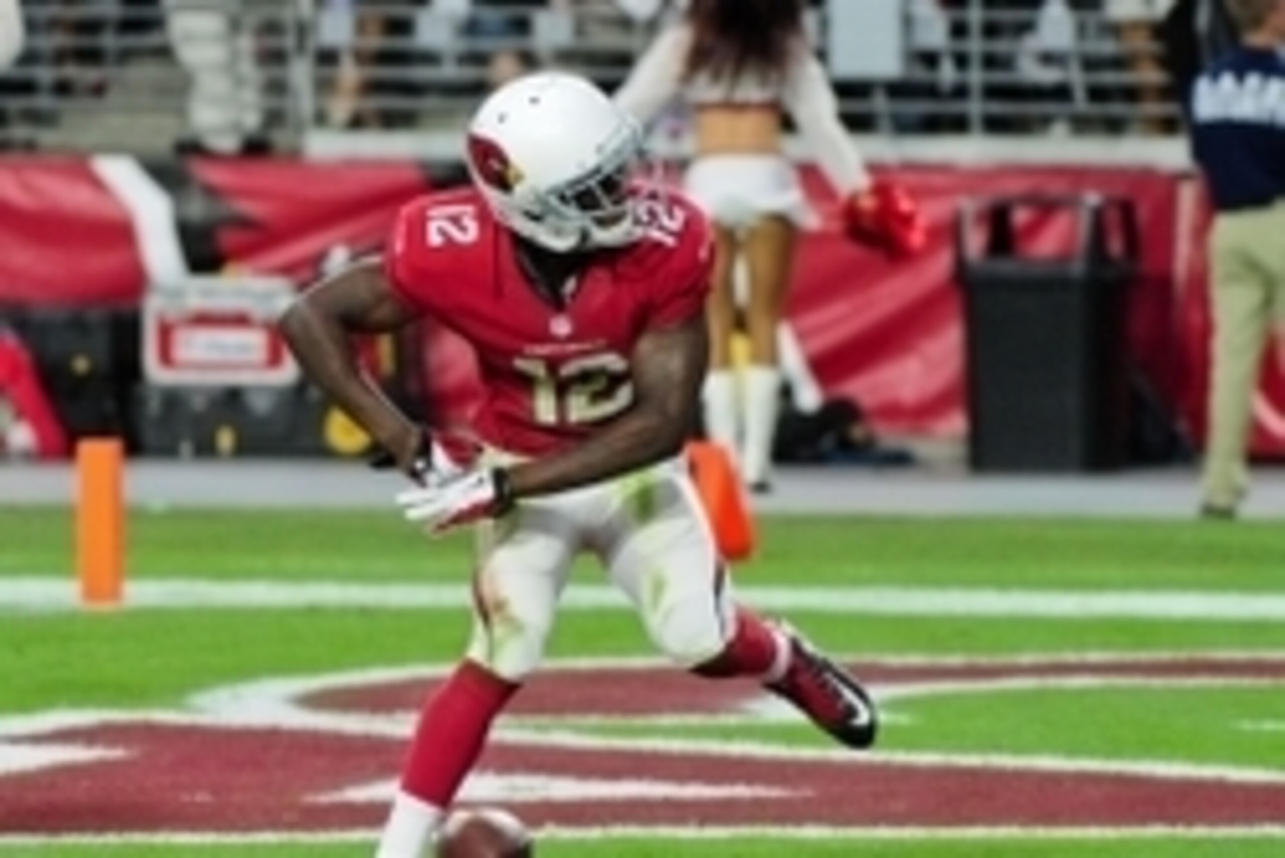 Oct 26, 2014; Glendale, AZ, USA; Arizona Cardinals wide receiver John Brown (12) celebrates by dancing after a 75 yard touchdown during the second half against the Philadelphia Eagles at University of Phoenix Stadium. Mandatory Credit: Matt Kartozian-USA 