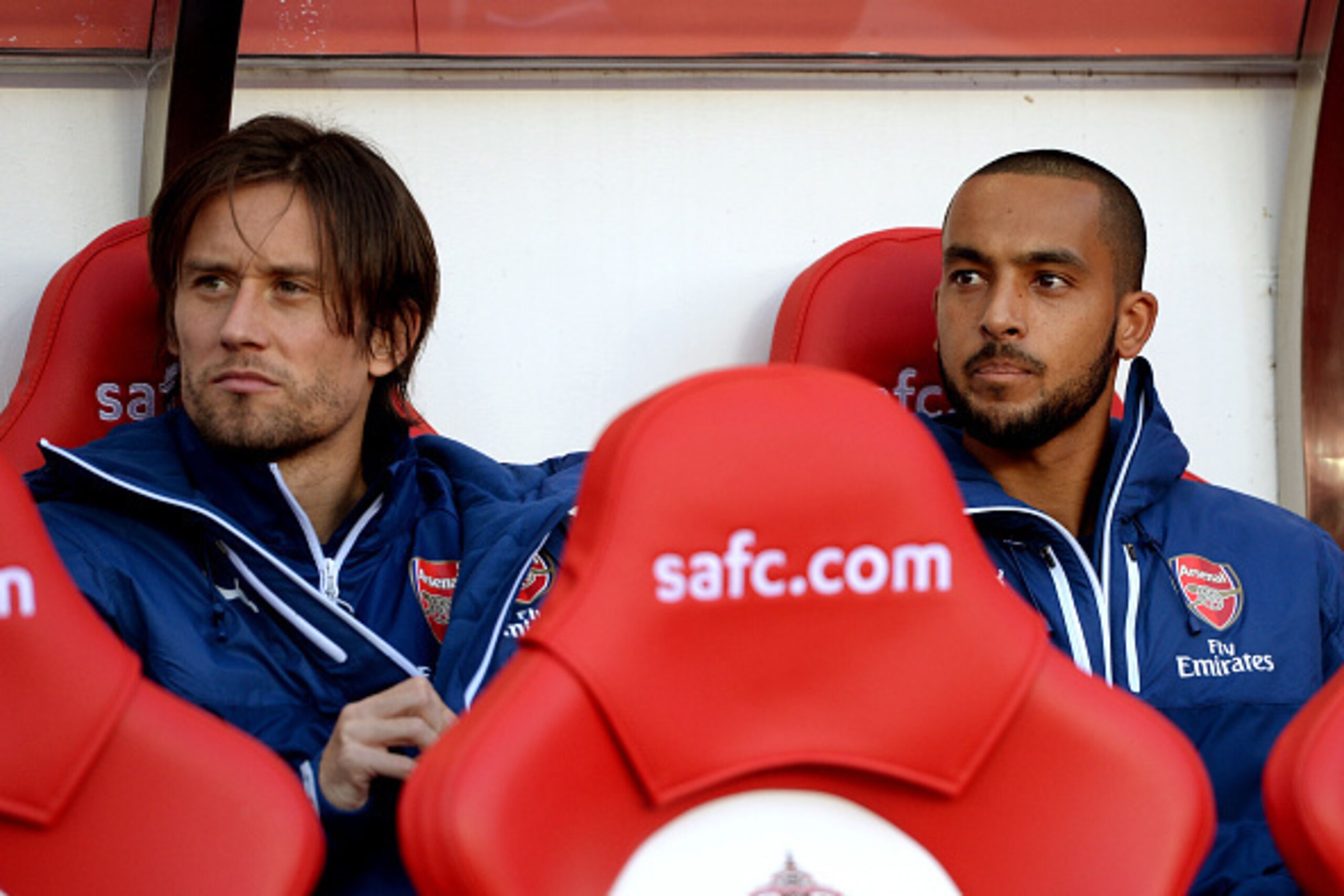 SUNDERLAND, ENGLAND - OCTOBER 25:  Arsenal substitutes Tomas Rosicky and Theo Walcott look on  during the Barclays Premier League match between Sunderland and Arsenal at the Stadium of Light on October 25, 2014 in Sunderland, England.  (Photo by Gareth Co