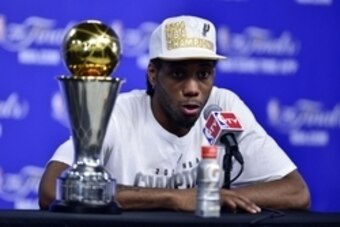 Jun 15, 2014; San Antonio, TX, USA; San Antonio Spurs forward Kawhi Leonard (2) speaks during a press conference after game five of the 2014 NBA Finals against the Miami Heat at AT&T Center. Mandatory Credit: Bob Donnan-USA TODAY Sports