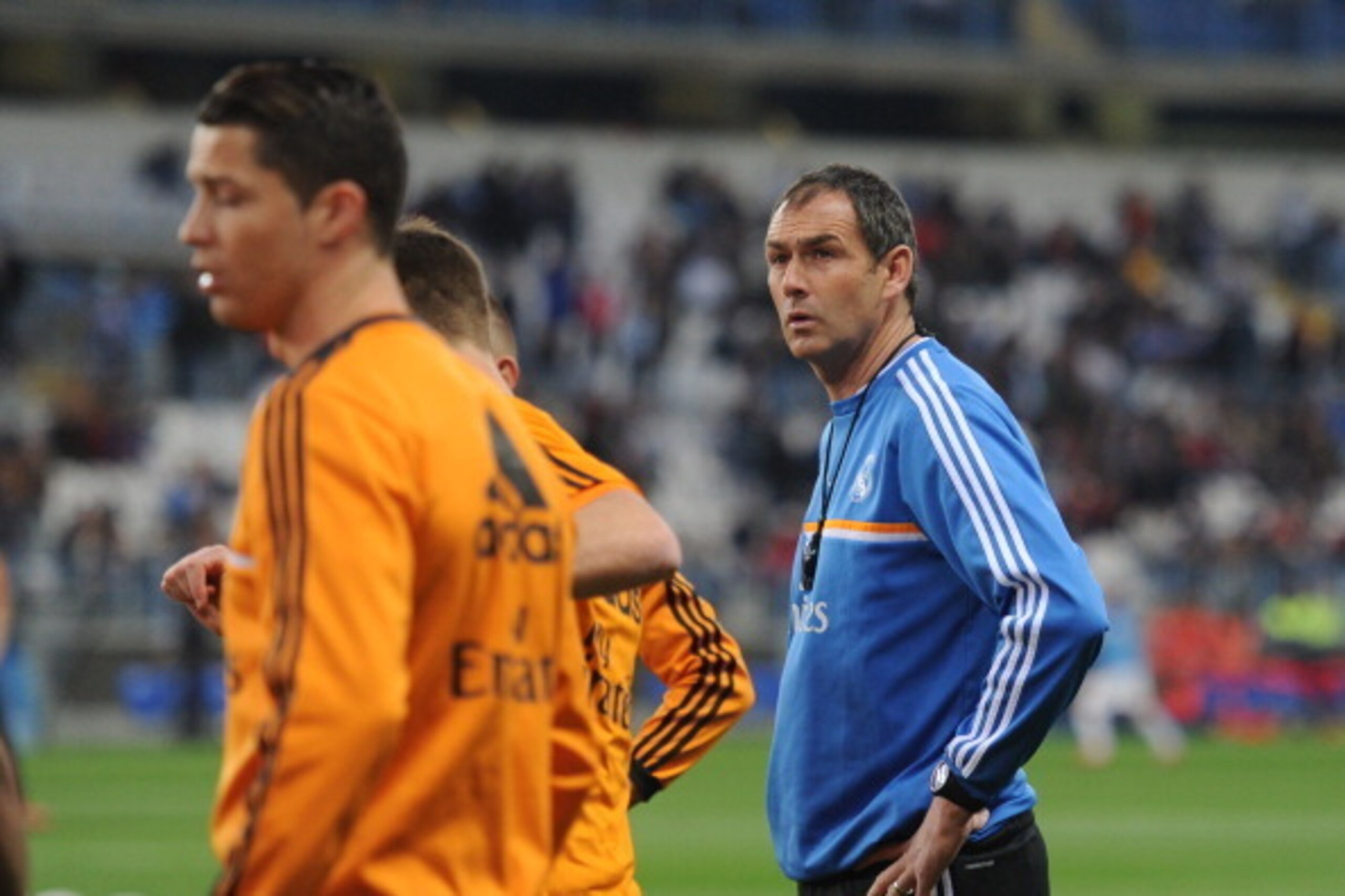 MALAGA, SPAIN - MARCH 15:  Assistant coach Paul Clement (R) of Real Madrid FC Cristiano Ronaldo warm up before their La Liga match between Malaga and Real Madrid at La Rosaleda Stadium on March 15, 2014 in Malaga, Spain.  (Photo by Denis Doyle/Getty Image
