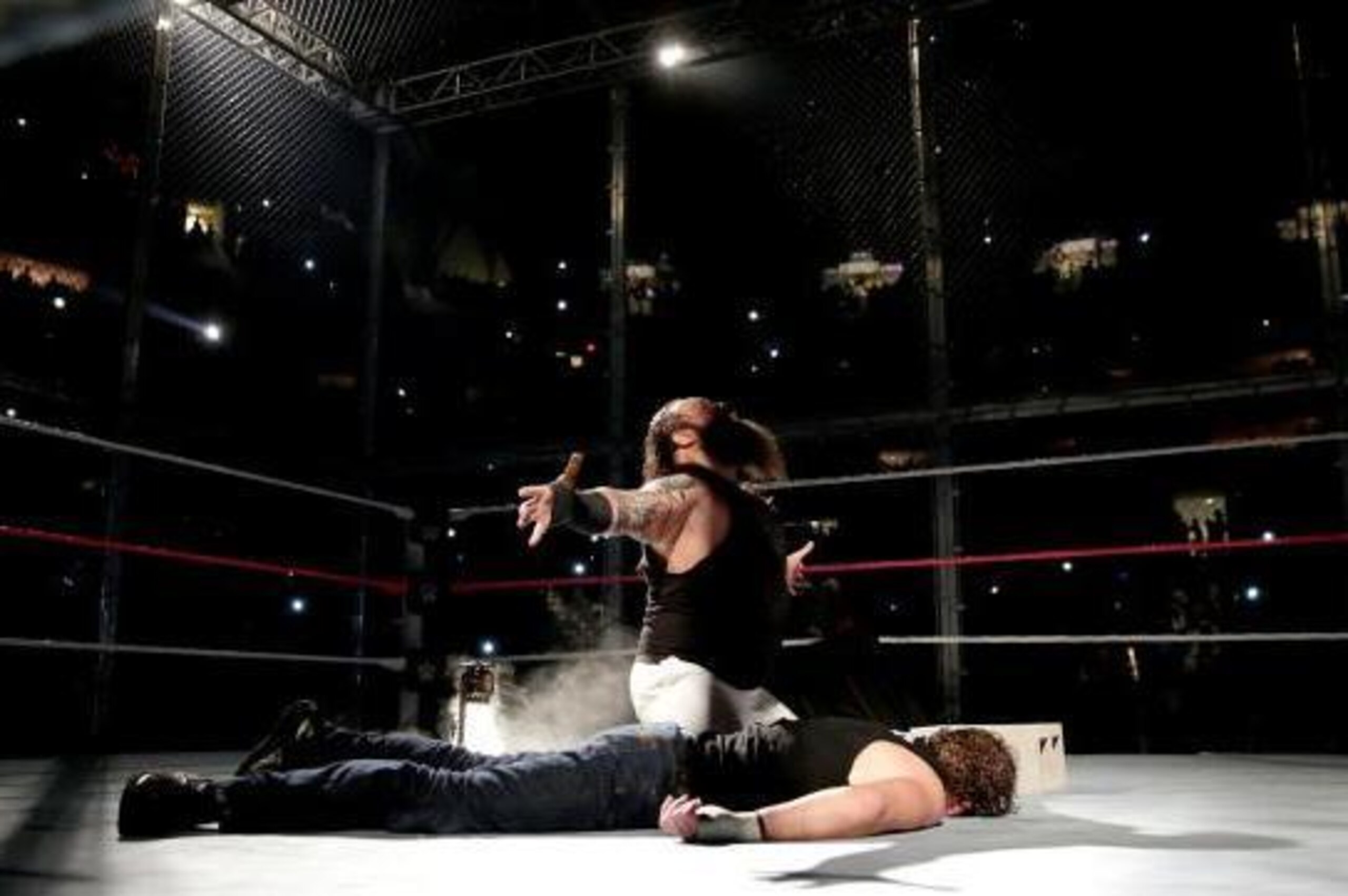Bray Wyatt poses after knocking Dean Ambrose out.