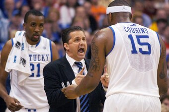 Kentucky coach John Calipari forcefully instructs DeMarcus Cousins.