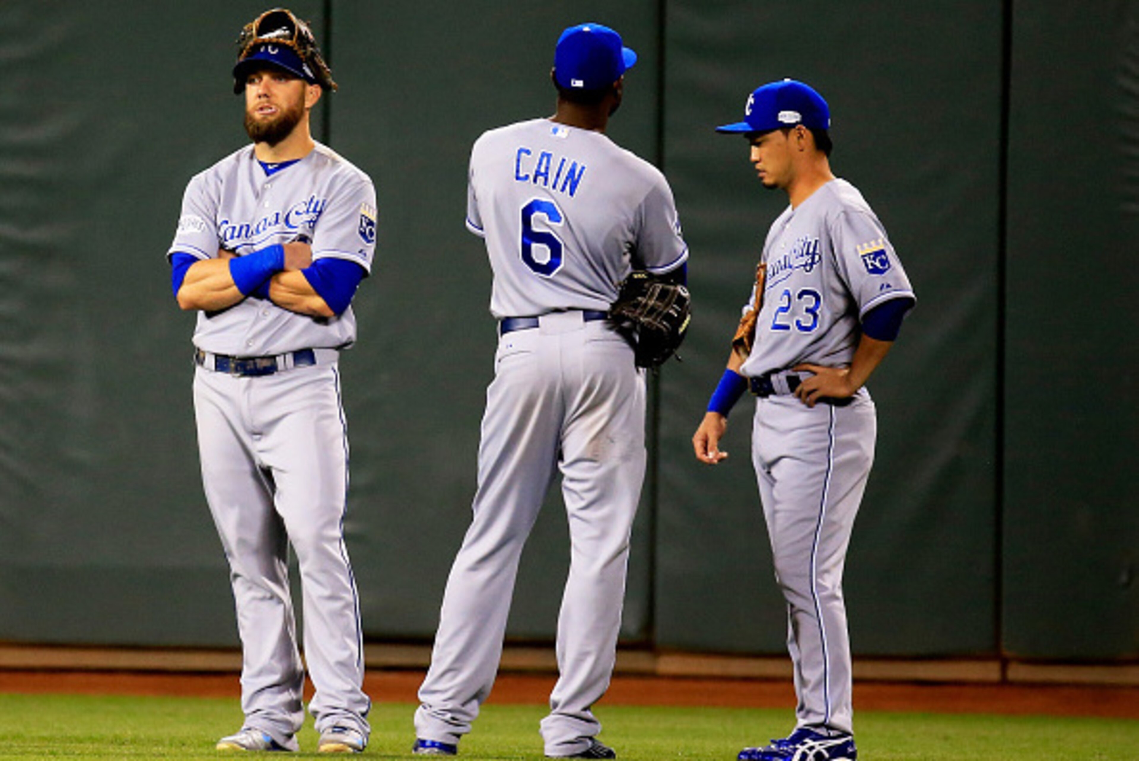 SAN FRANCISCO, CA - OCTOBER 26: Alex Gordon #4, Lorenzo Cain #6, and Norichika Aoki #23 of the Kansas City Royals stand in the outfield during a pitching change in the eighth inning against the San Francisco Giants during Game Five of the 2014 World Serie SAN FRANCISCO, CA - OCTOBER 26: Alex Gordon #4, Lorenzo Cain #6, and Norichika Aoki #23 of the Kansas City Royals stand in the outfield during a pitching change in the eighth inning against the San Francisco Giants during Game Five of the 2014 World Serie