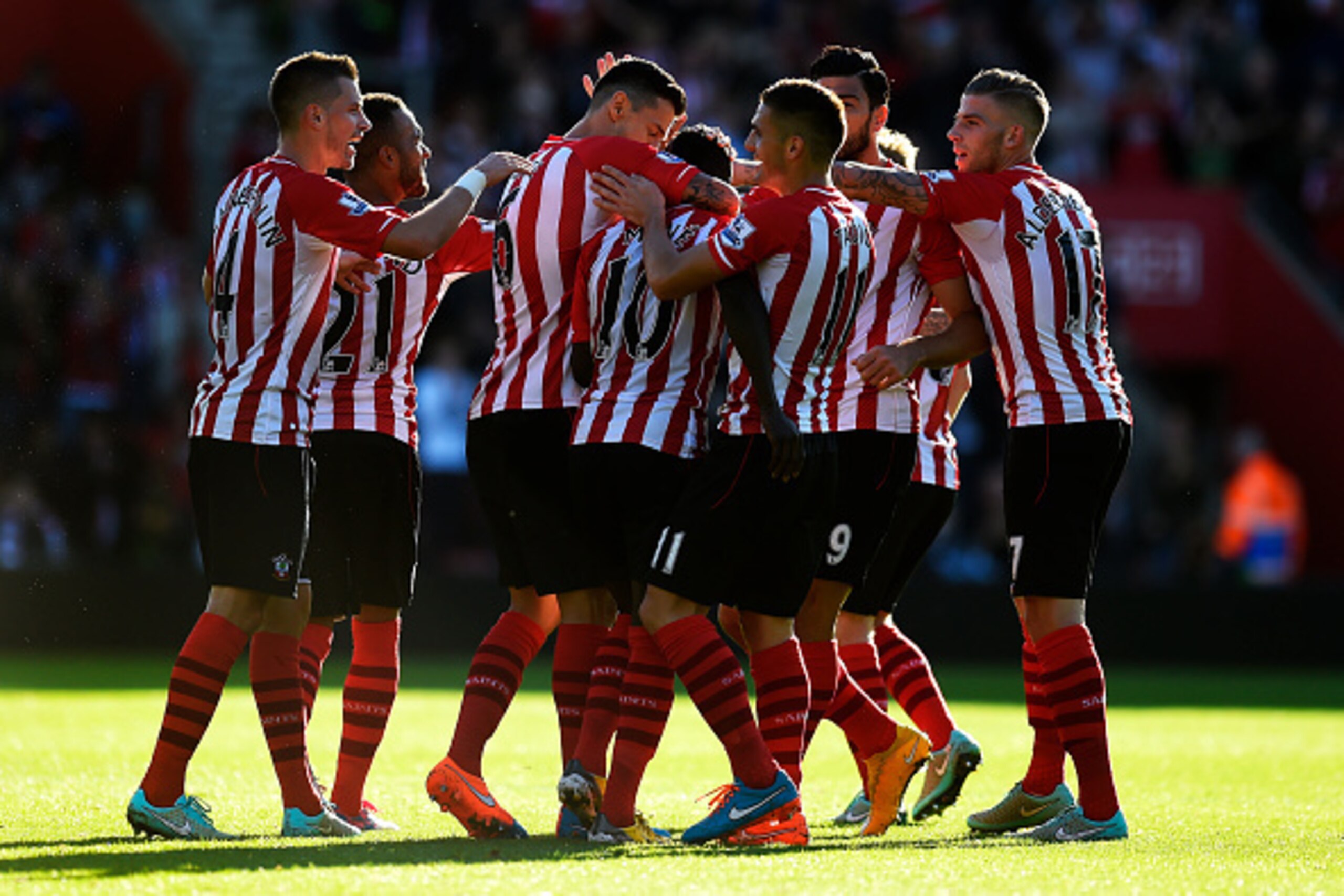 SOUTHAMPTON, ENGLAND - OCTOBER 25:  Sadio Mane of Southampton celebrates with team-mates after scoring the opening goal during the Barclays Premier League match between Southampton and Stoke City at St Mary's Stadium on October 25, 2014 in Southampton, En